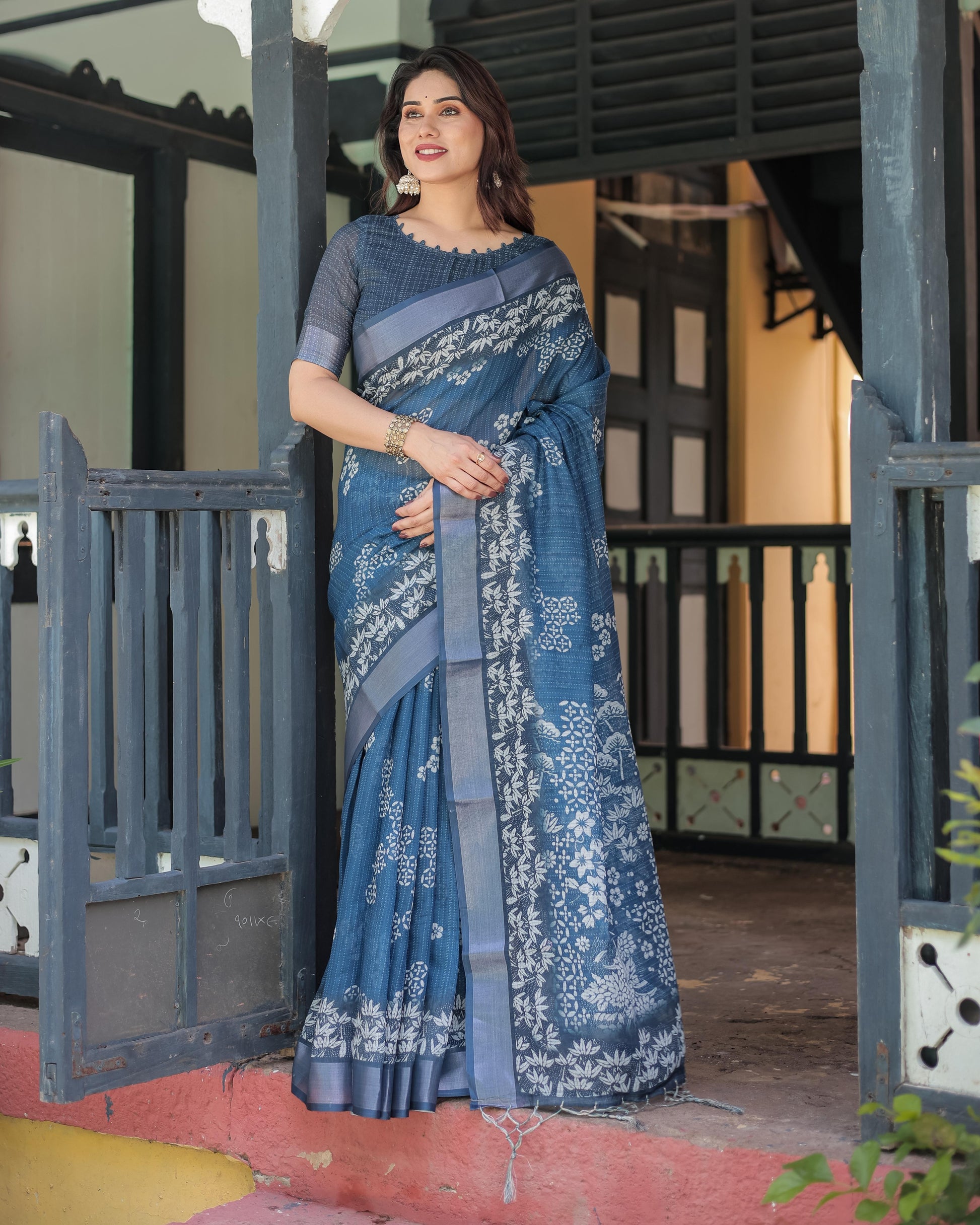 Steel Blue Linen Floral Printed Saree with Elegant Border Design and Tassel Detailing with Unstitched Blouse for Women