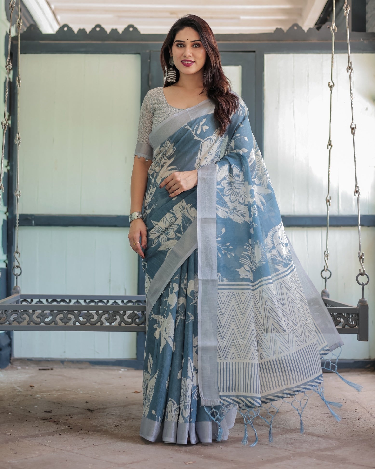 Pastel Blue Floral and Geometric Printed Cotton Linen Saree and Tassel Edges With Unstitched Blouse