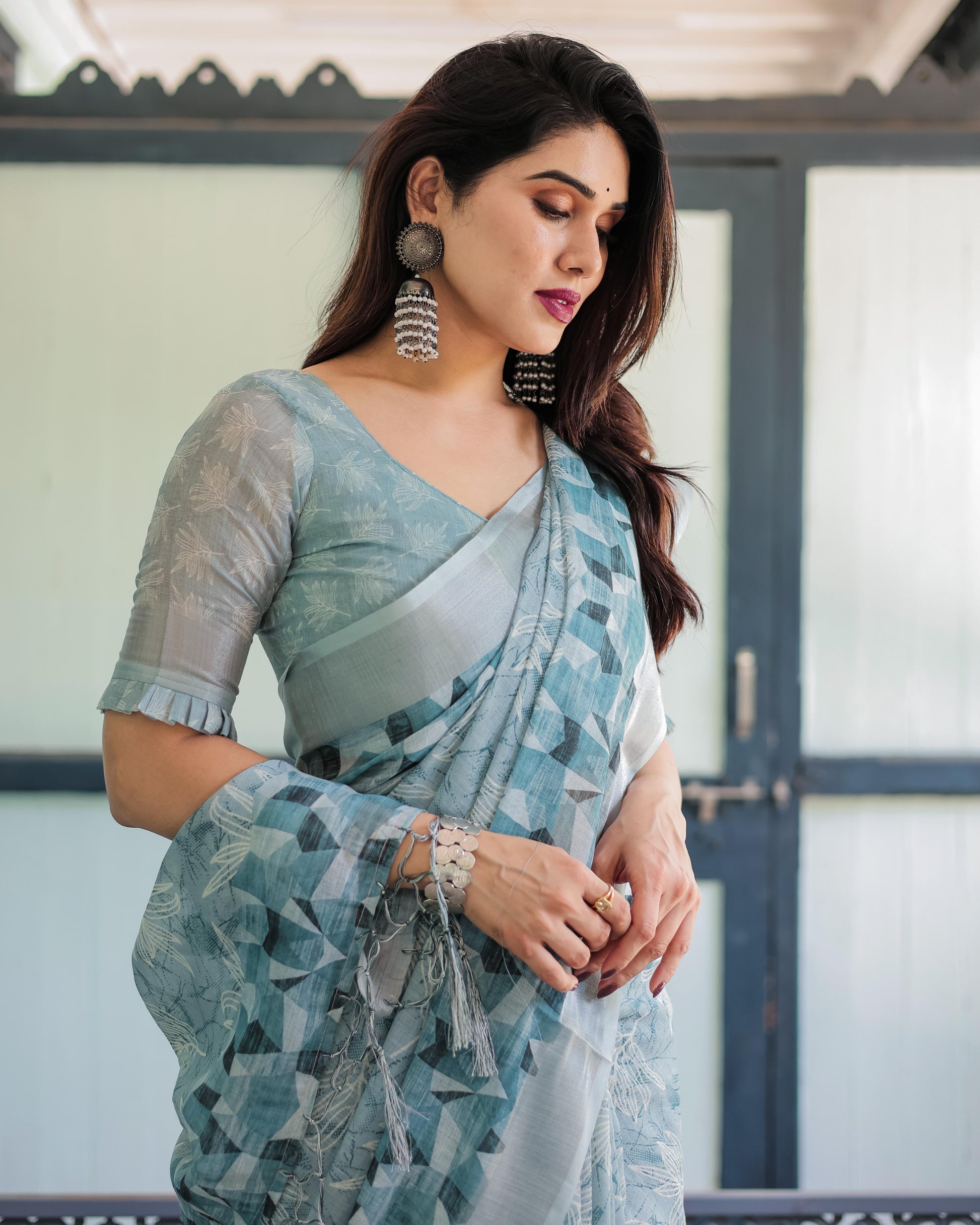Light Blue Pure Cotton Linen Saree with Geometric and Floral Patterns And Tassels With Unstitched Blouse