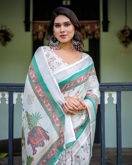 Ivory Pure Cotton Linen Saree Elephant Motif and Floral Pattern, Green and Pink Borders, and Tassels on Edges. With Unstitched Blouse