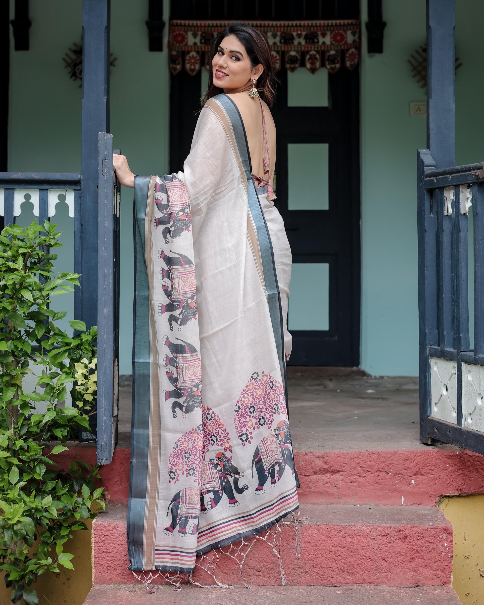 Ivory Pure Cotton Linen Saree And Elephant Motif and Tassel Detailing With Unstitched Blouse