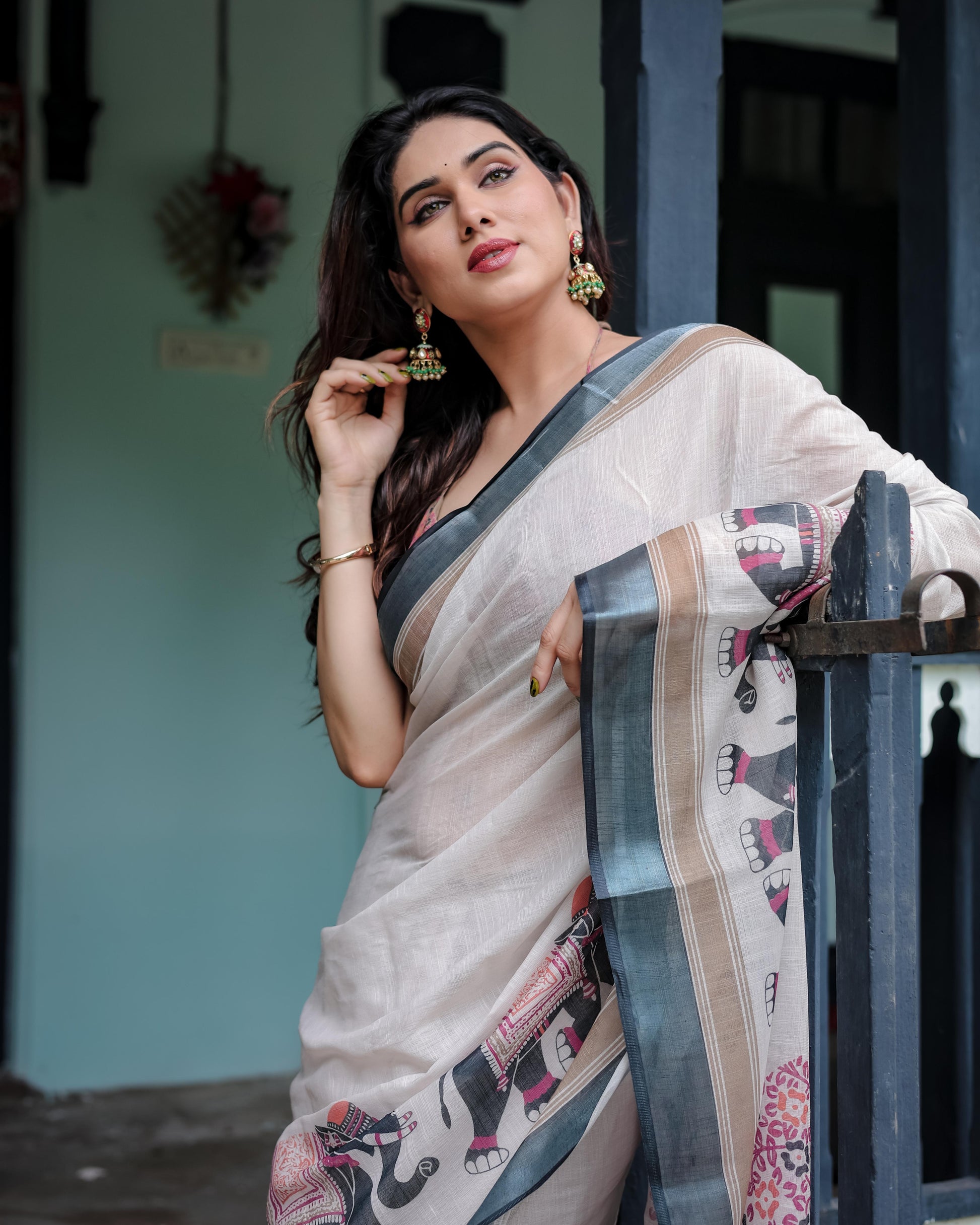 Ivory Pure Cotton Linen Saree And Elephant Motif and Tassel Detailing With Unstitched Blouse