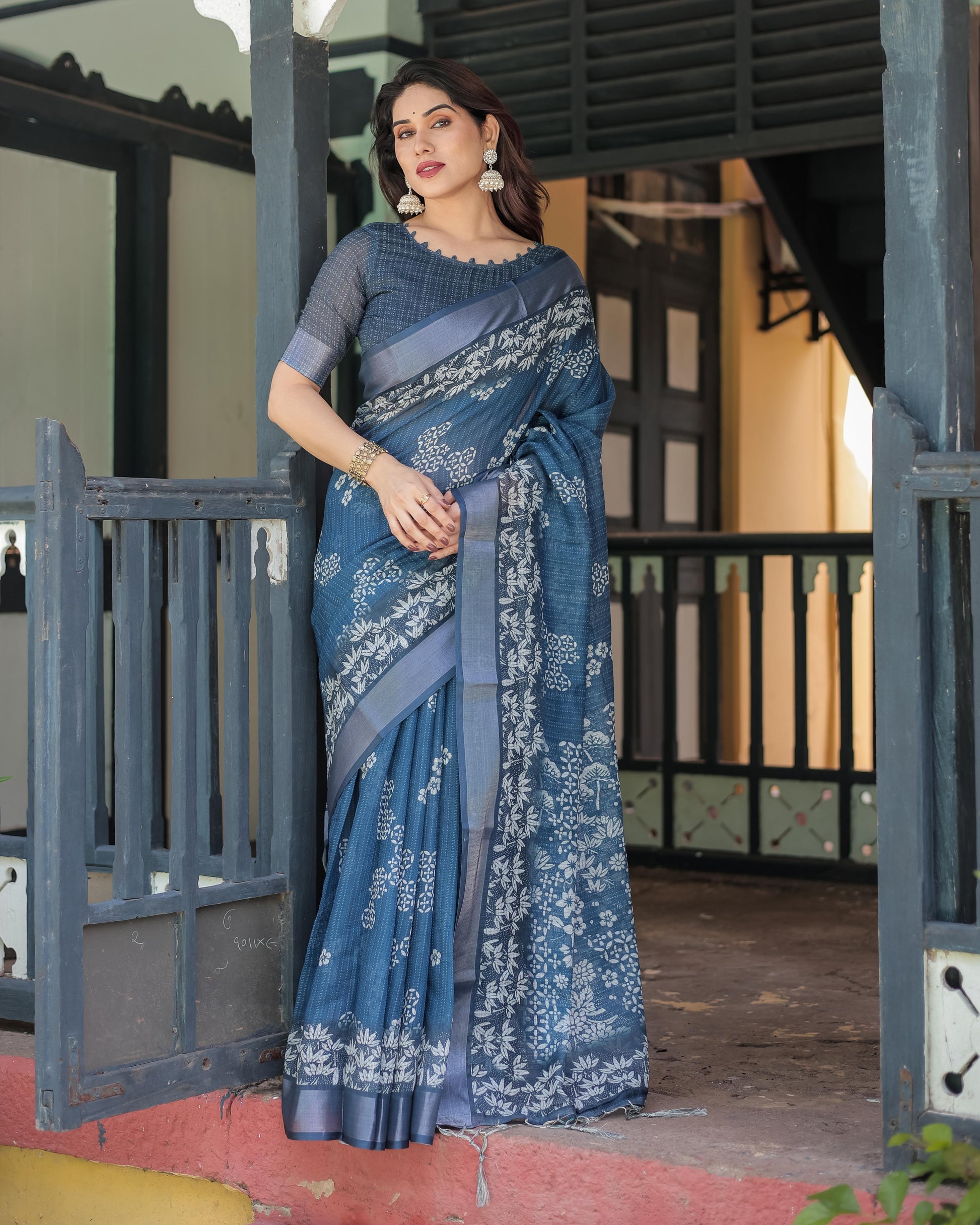 Steel Blue Linen Floral Printed Saree with Elegant Border Design and Tassel Detailing with Unstitched Blouse for Women