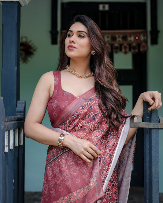 Rust Red Pure Cotton Linen Saree with Floral Block Print And Tassel Detailing With Unstitched Blouse