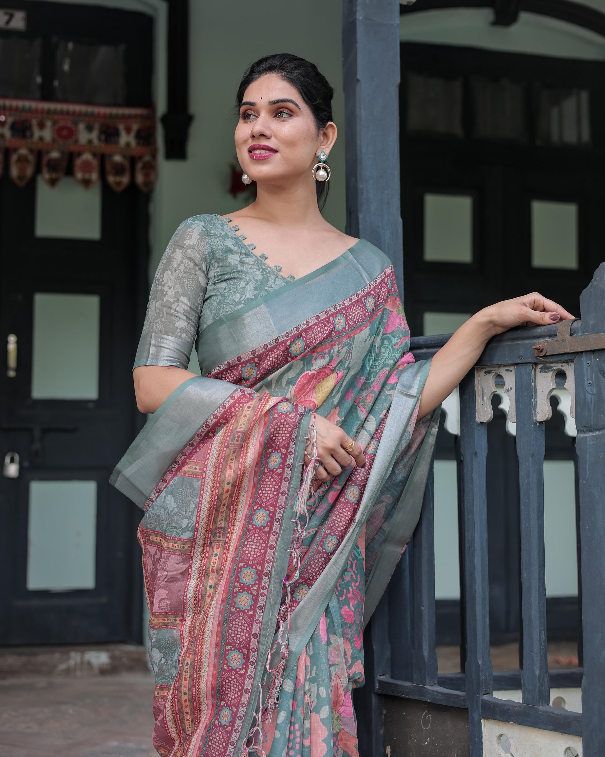 Sage Green Linen Printed Saree with Traditional Border Design and Tassel Detailing with Unstitched Blouse for Women