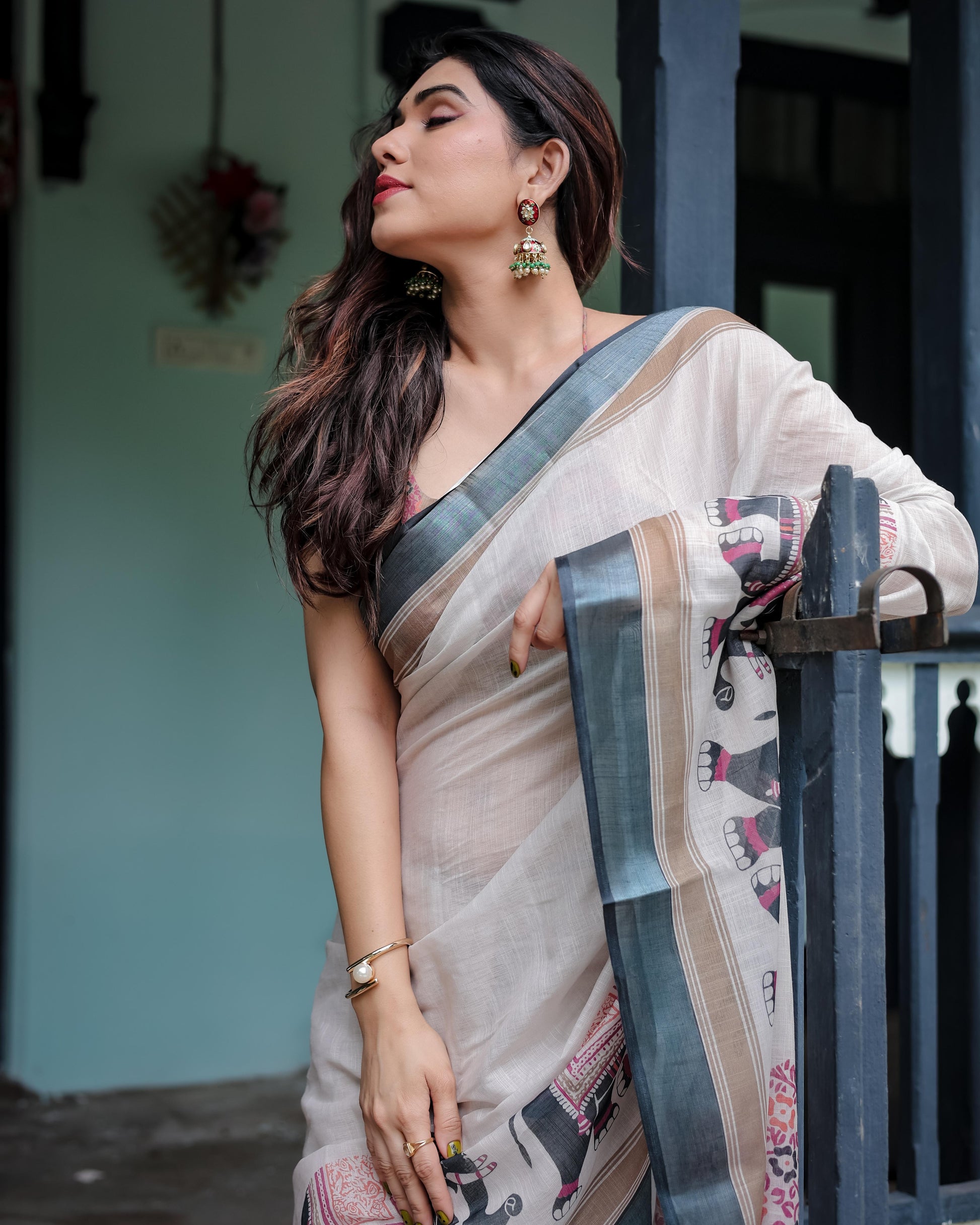 Ivory Pure Cotton Linen Saree And Elephant Motif and Tassel Detailing With Unstitched Blouse