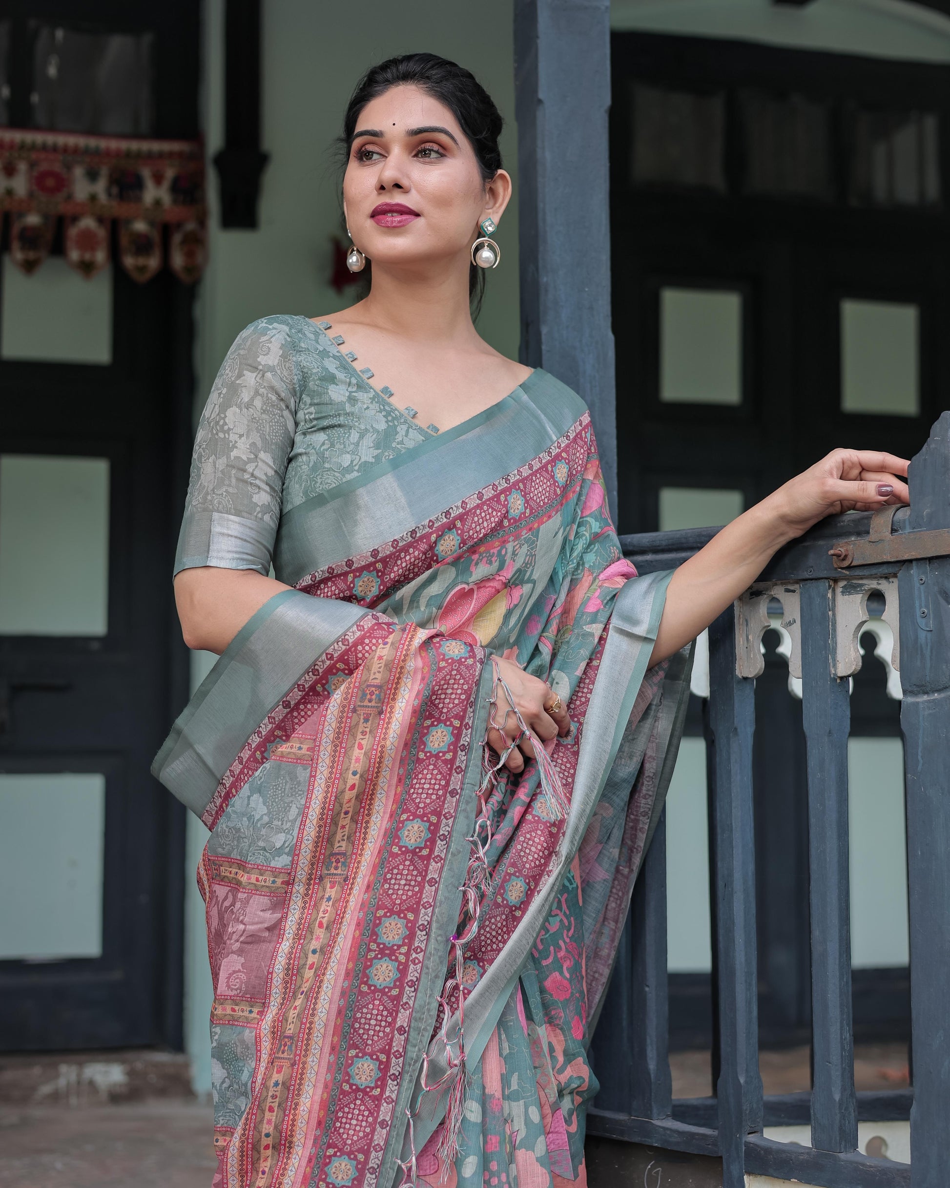 Sage Green Linen Printed Saree with Traditional Border Design and Tassel Detailing with Unstitched Blouse for Women