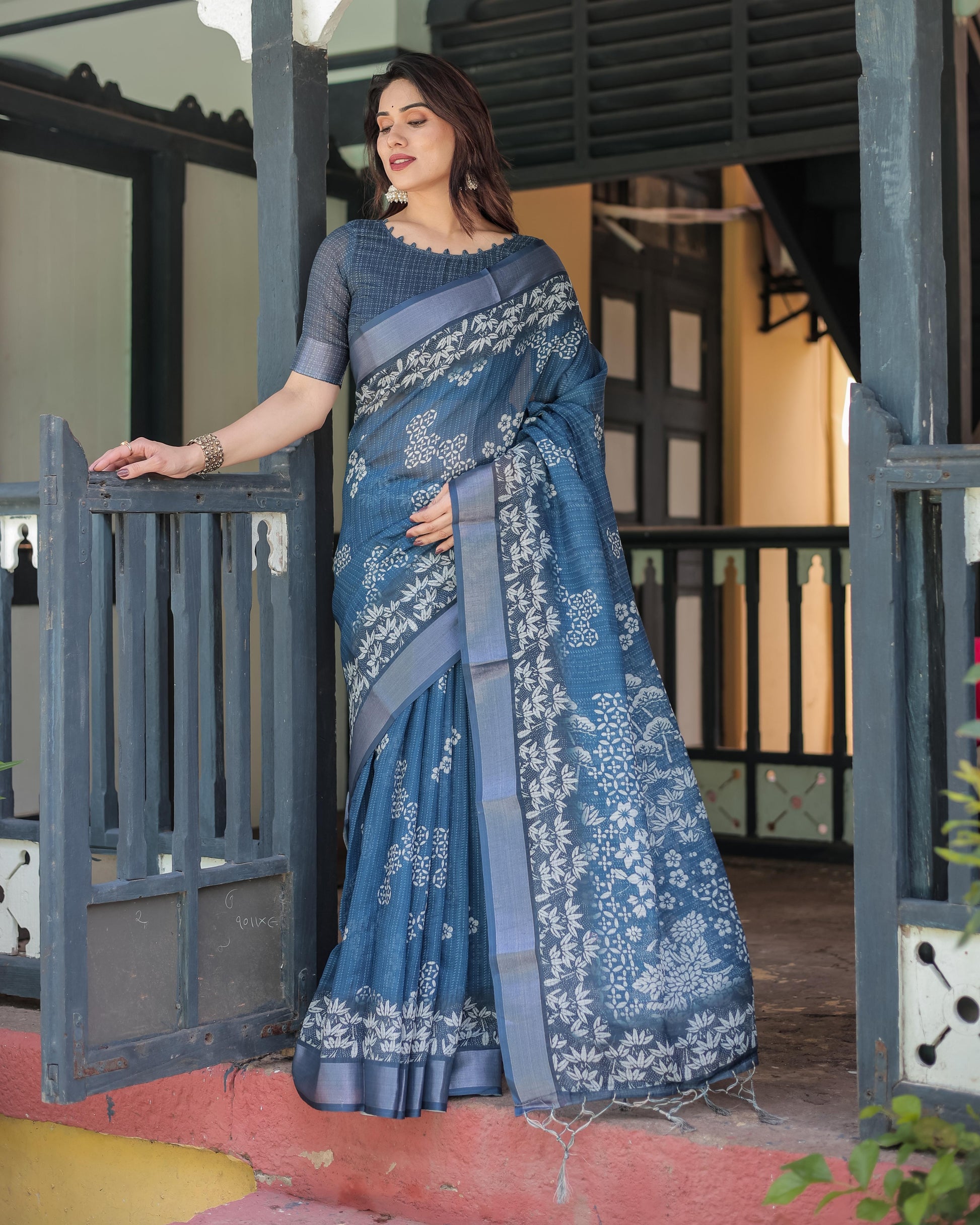 Steel Blue Linen Floral Printed Saree with Elegant Border Design and Tassel Detailing with Unstitched Blouse for Women