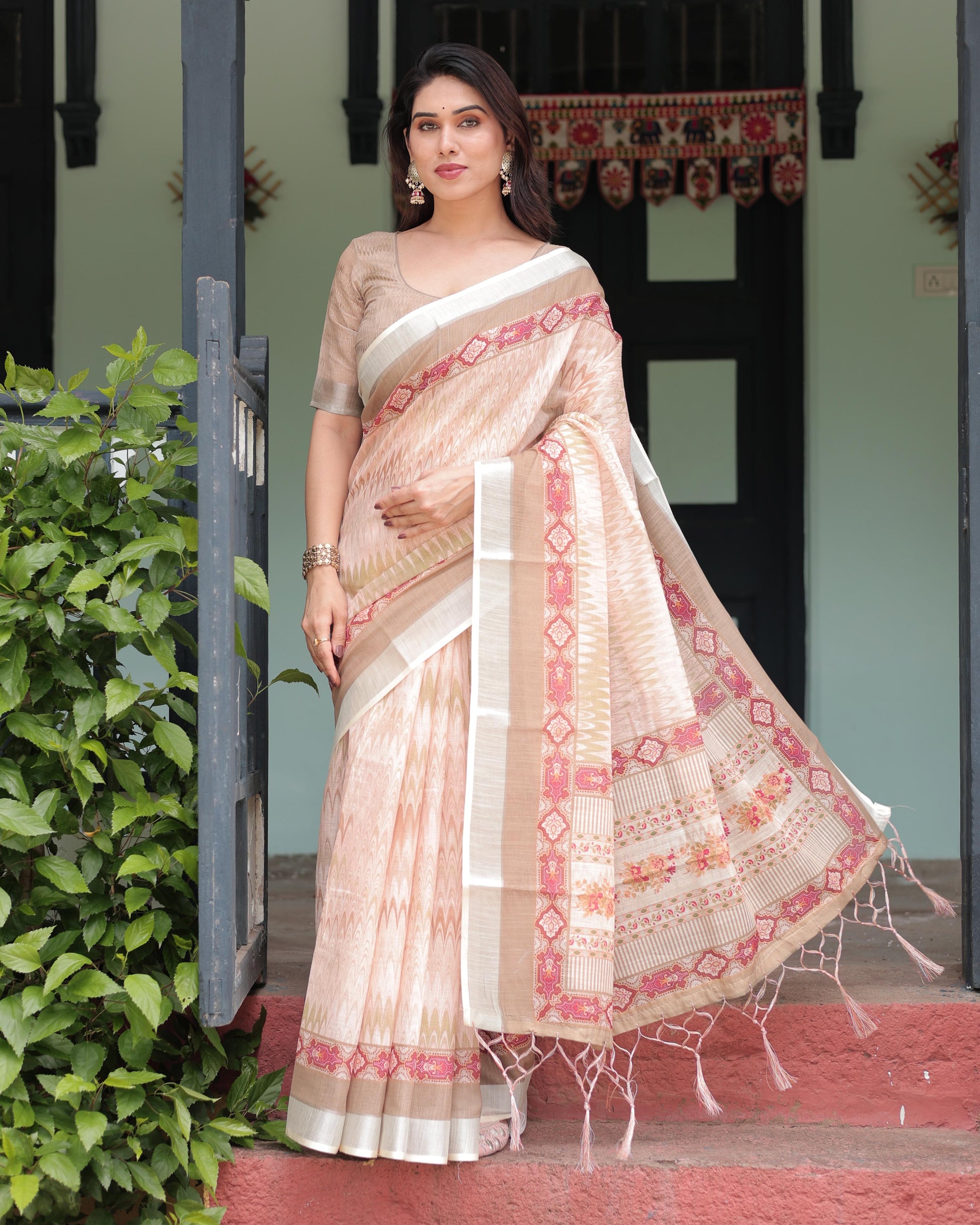 Peach Beige Linen Printed Saree with Designer Border and Tassel Detailing with Unstitched Blouse for Women