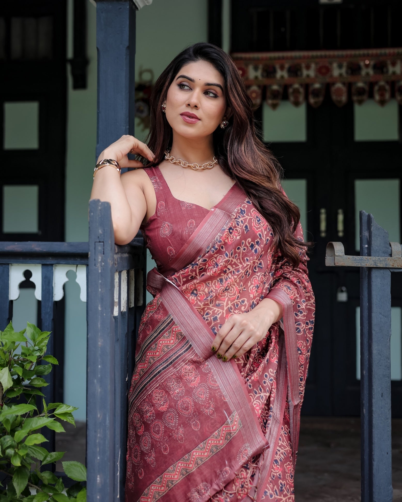 Rust Red Pure Cotton Linen Saree with Floral Block Print And Tassel Detailing With Unstitched Blouse