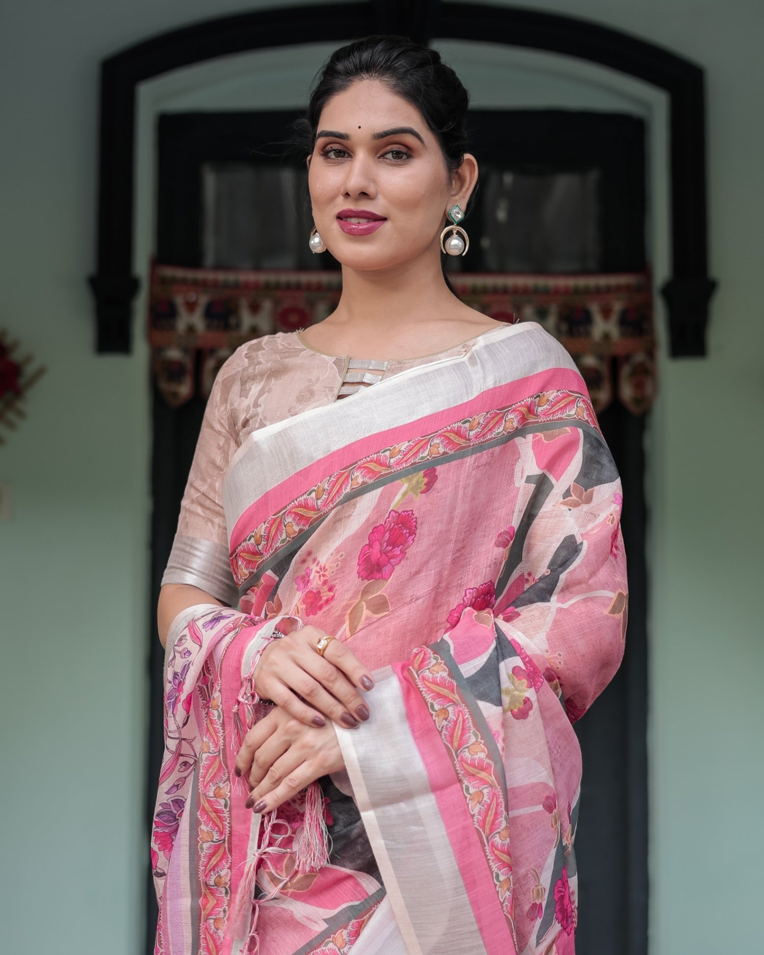 Dusty Pink Linen Floral Printed Saree with Elegant Border and Tassel Detailing with Unstitched Blouse for Women