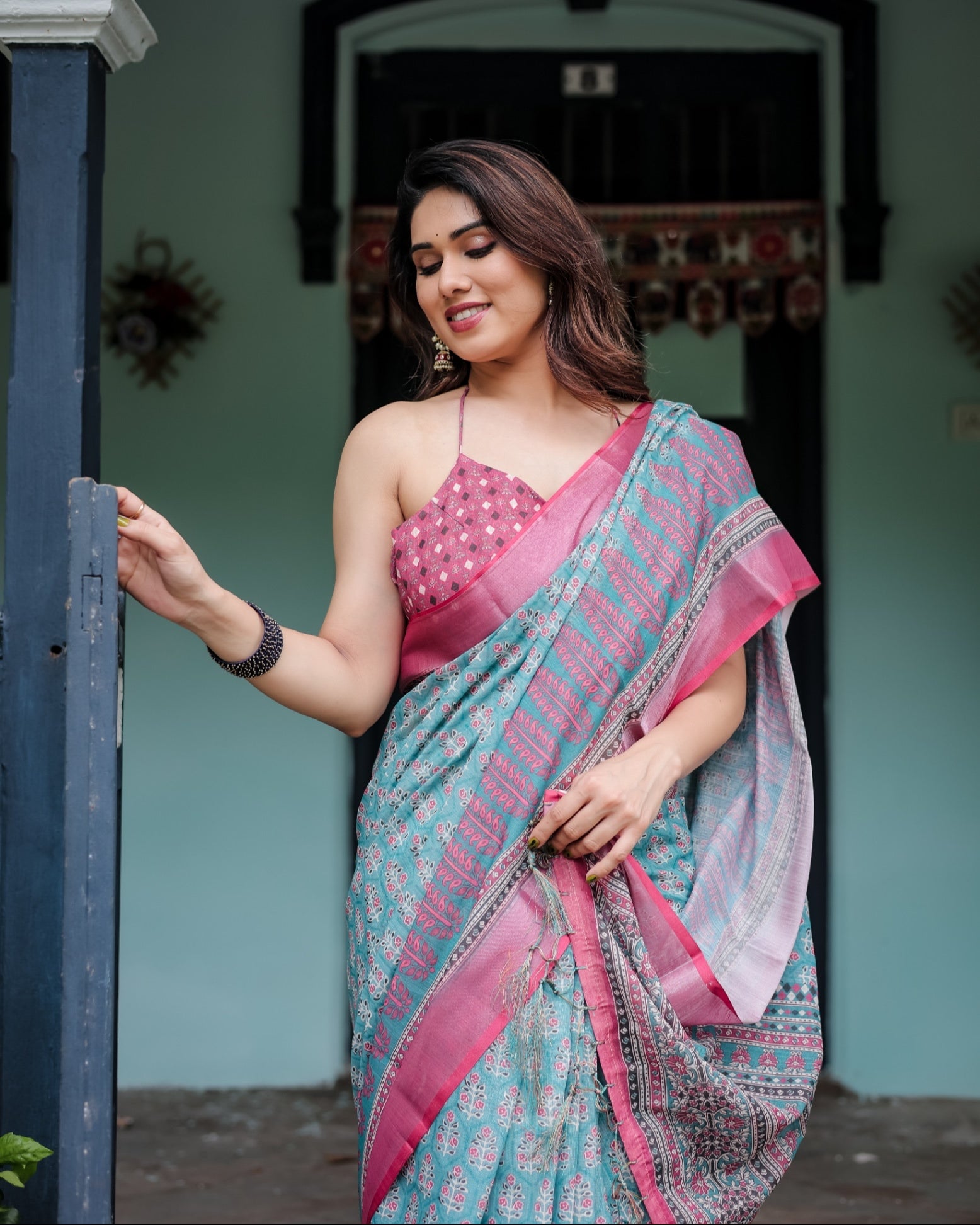 Aqua Blue Pure Cotton Linen Saree Pink Border, Floral Motifs, and Tassel Detailing With Unstitched Blouse