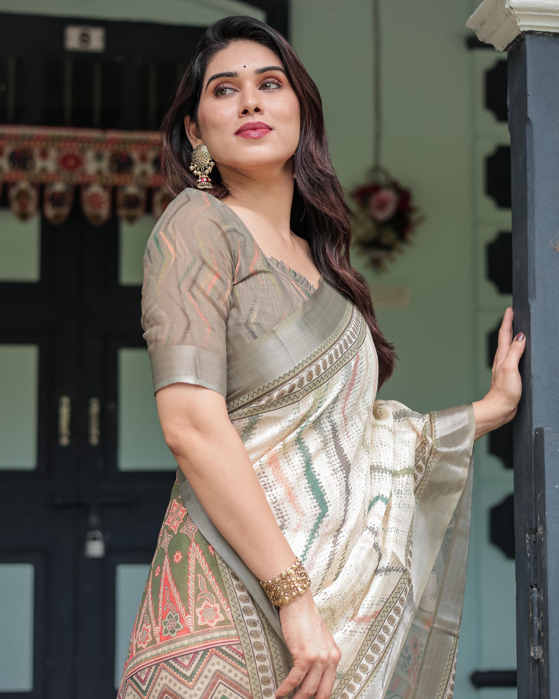 Cream and Olive Green Linen Printed Saree with Ethnic Pattern Border and Tassel Detailing with Unstitched Blouse for Women