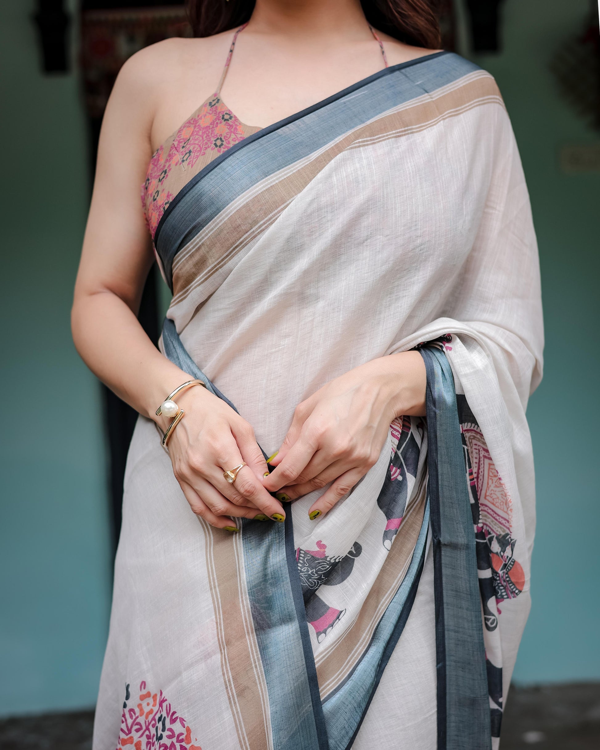 Ivory Pure Cotton Linen Saree And Elephant Motif and Tassel Detailing With Unstitched Blouse