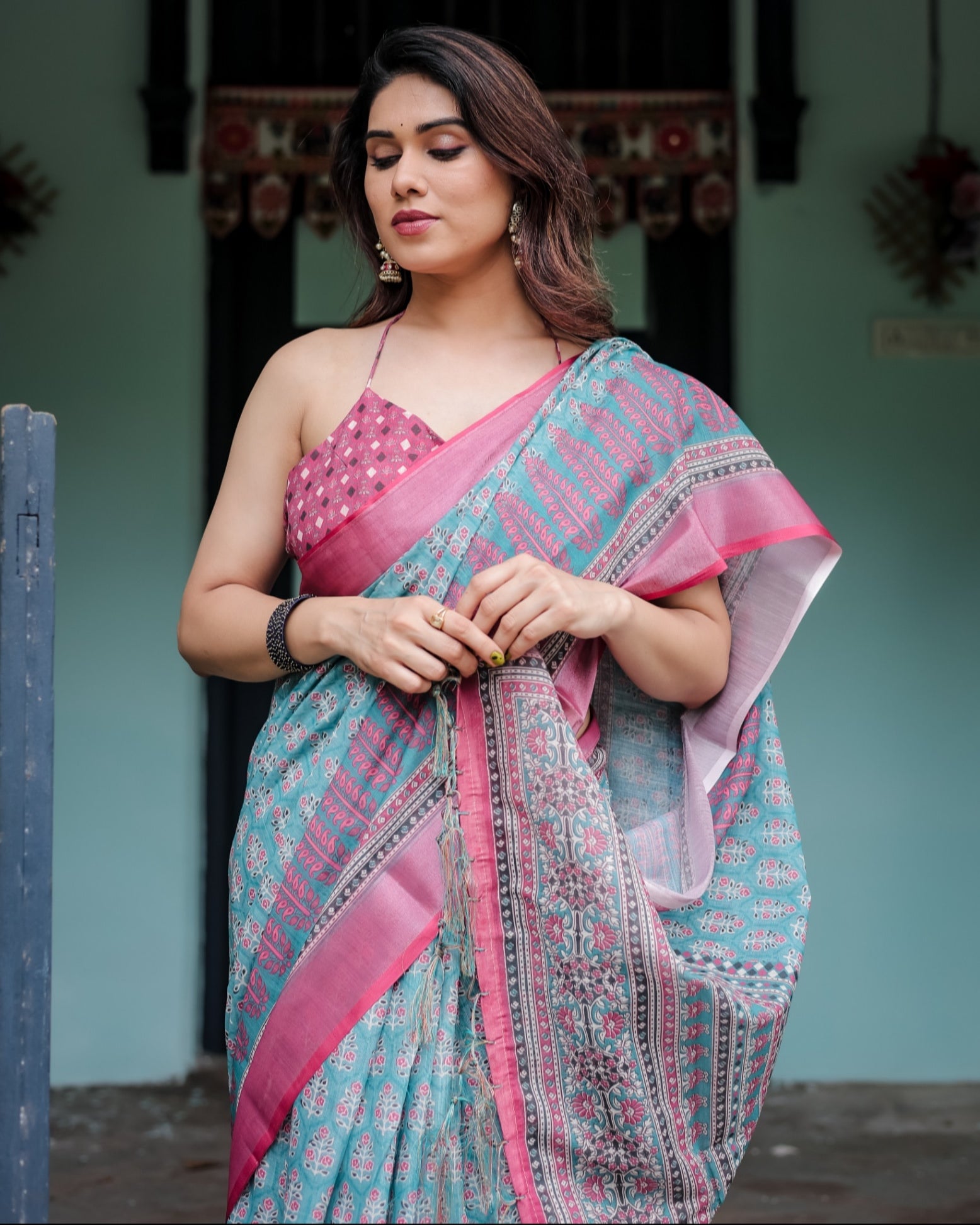 Aqua Blue Pure Cotton Linen Saree Pink Border, Floral Motifs, and Tassel Detailing With Unstitched Blouse
