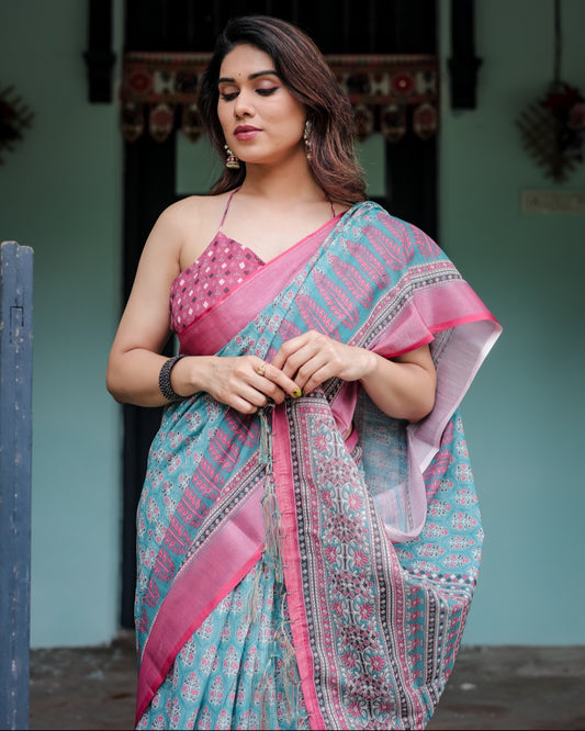 Aqua Blue Pure Cotton Linen Saree Pink Border, Floral Motifs, and Tassel Detailing With Unstitched Blouse