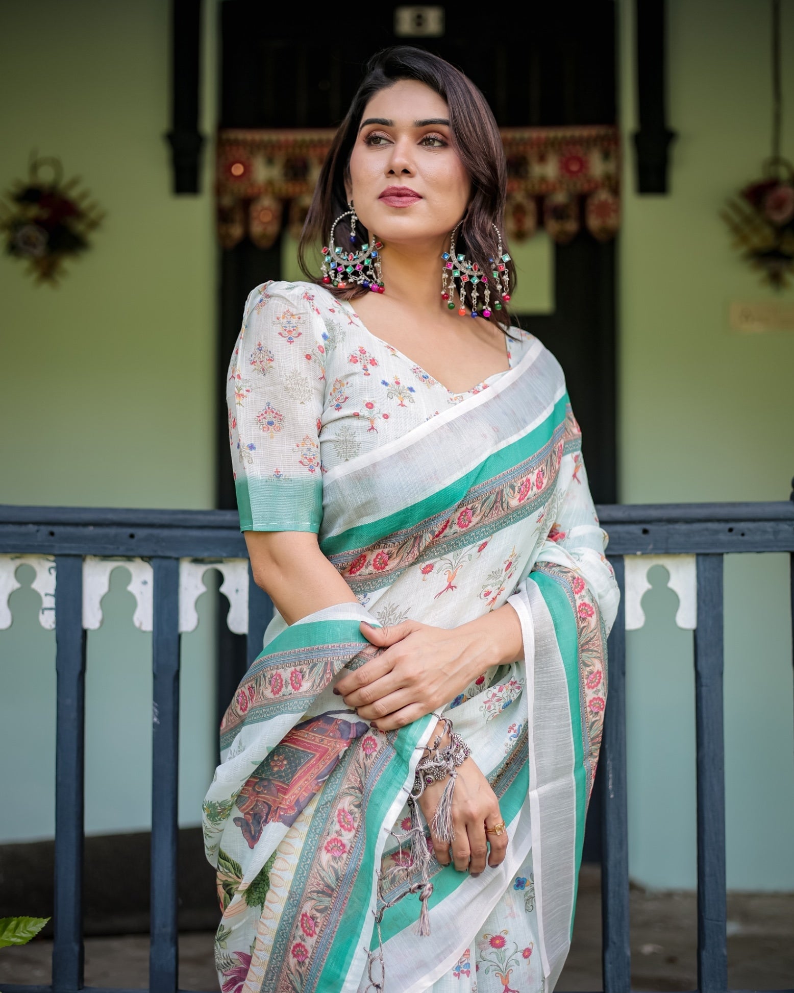 Ivory Pure Cotton Linen Saree Elephant Motif and Floral Pattern, Green and Pink Borders, and Tassels on Edges. With Unstitched Blouse