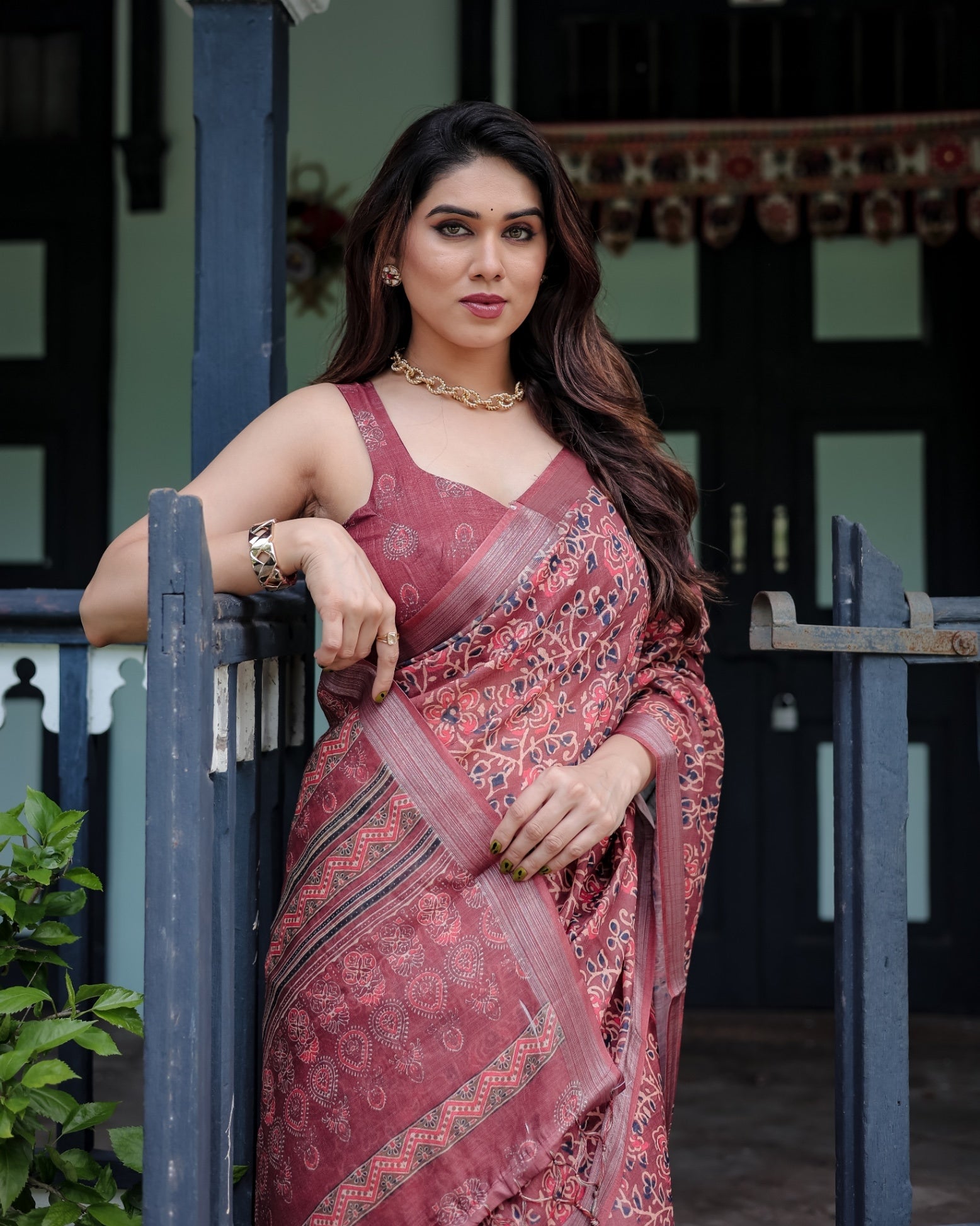 Rust Red Pure Cotton Linen Saree with Floral Block Print And Tassel Detailing With Unstitched Blouse