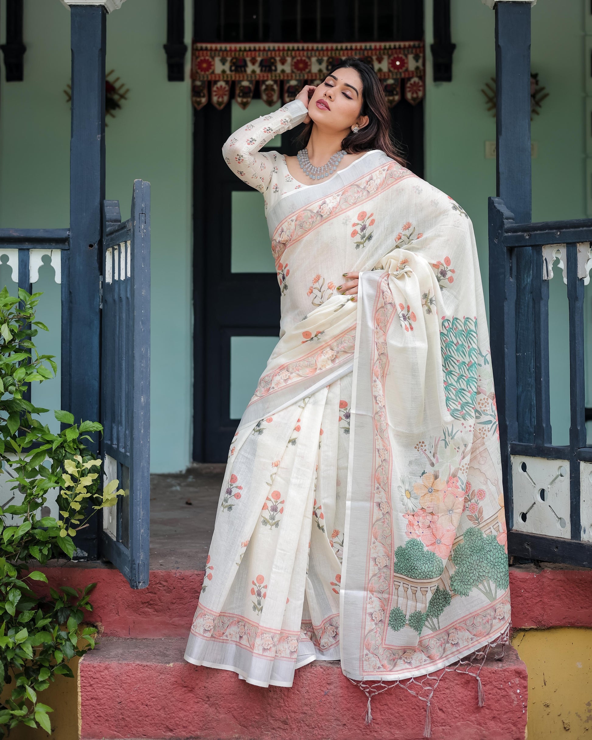 Ivory Pure Cotton Linen Saree with Pastel Floral Design And Tassel Detailing With Unstitched Blouse