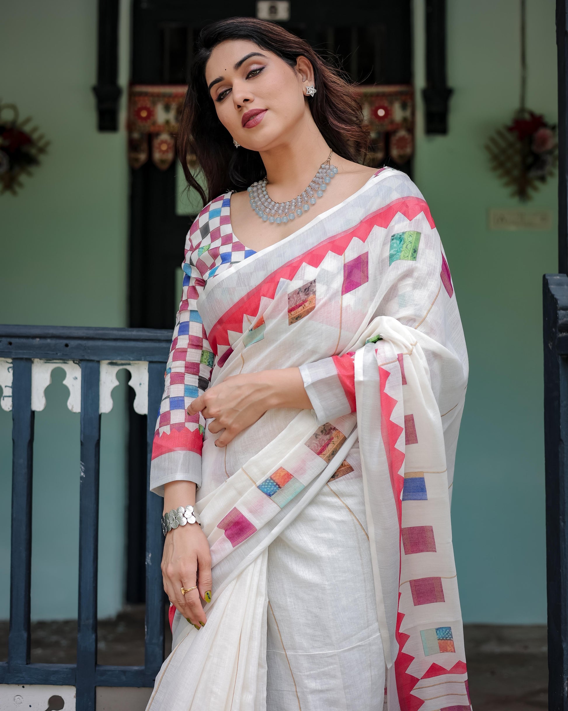 White Pure Cotton Linen Saree with Multicolor Checkered Design And Tassel Detailing With Unstitched Blouse