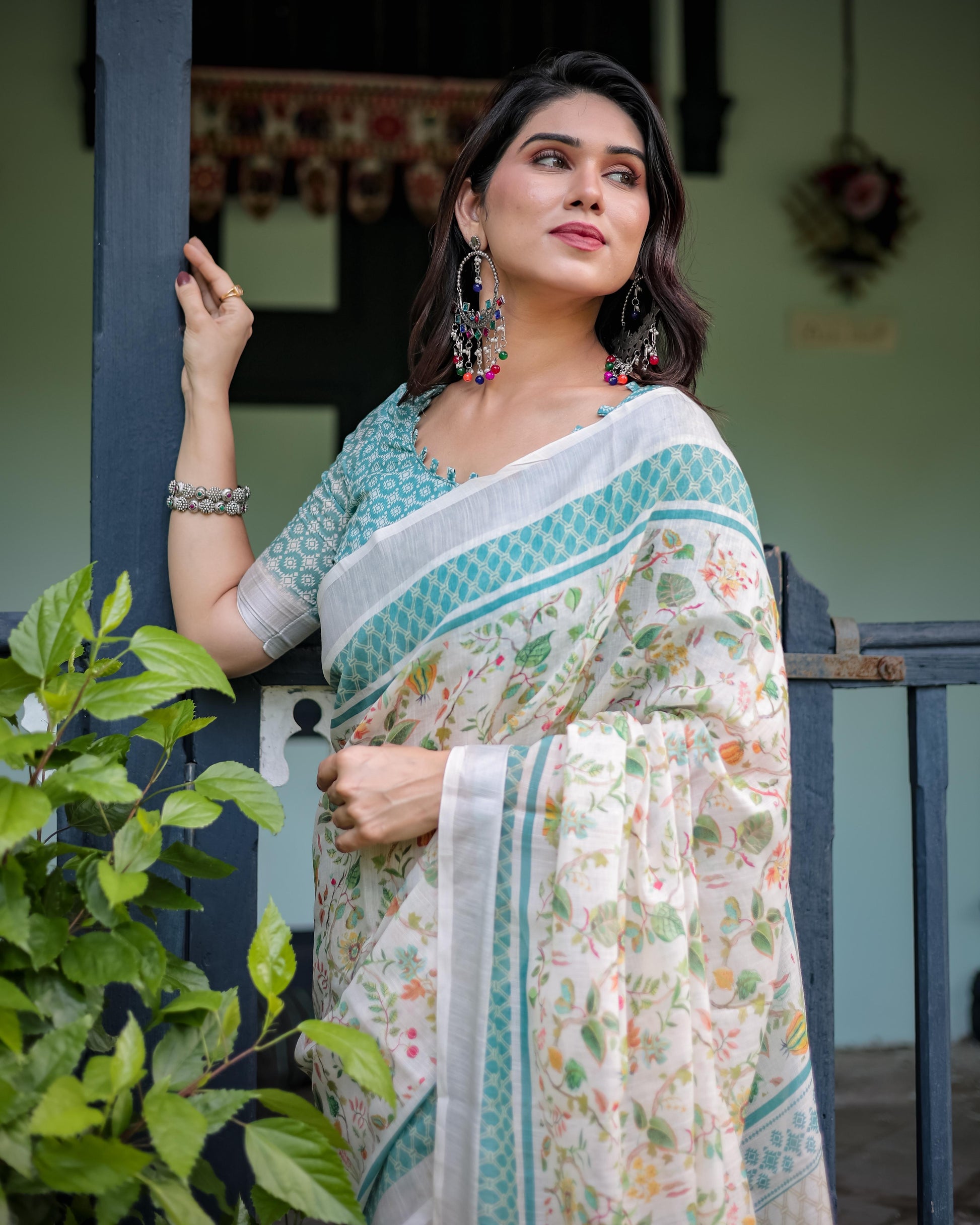 Elegant Floral Printed Pure Cotton Linen Saree in Ivory with Teal Border and , Tassels on Edges With Unstitched Blouse