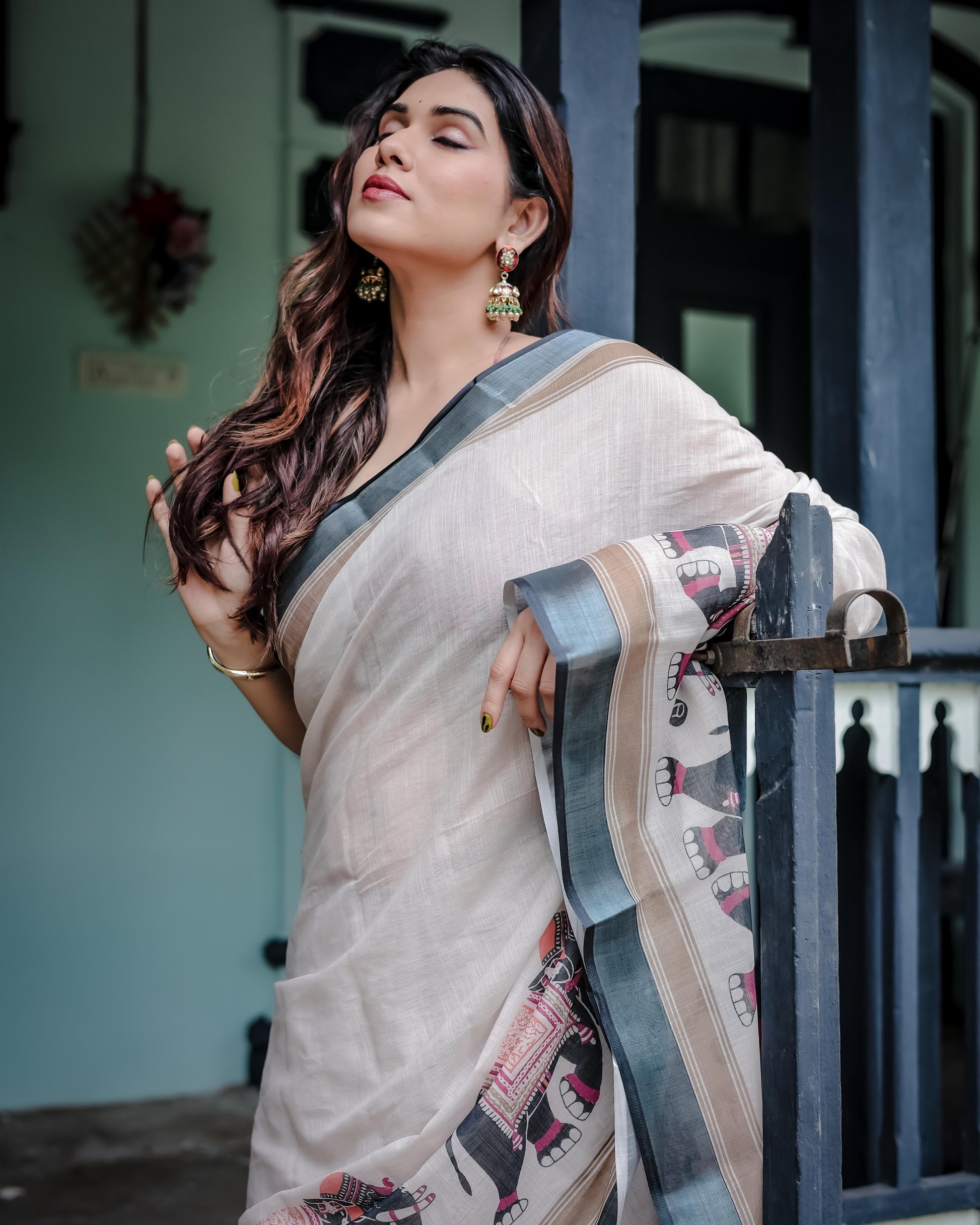 Ivory Pure Cotton Linen Saree And Elephant Motif and Tassel Detailing With Unstitched Blouse
