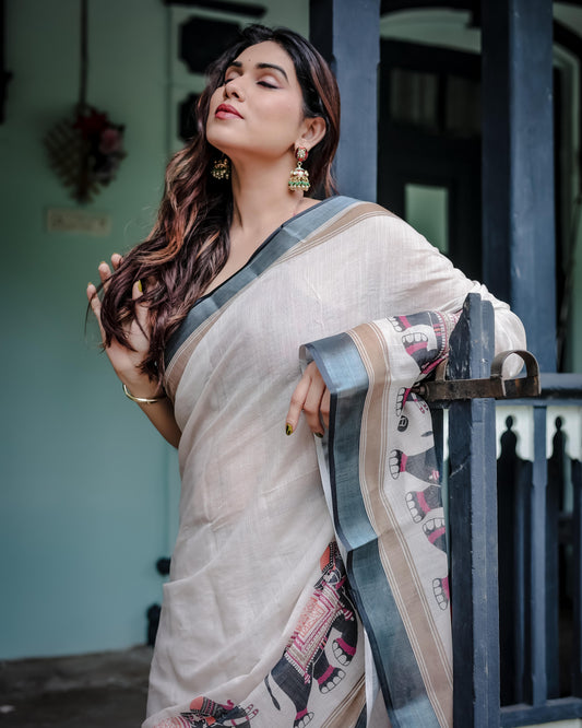 Ivory Pure Cotton Linen Saree And Elephant Motif and Tassel Detailing With Unstitched Blouse