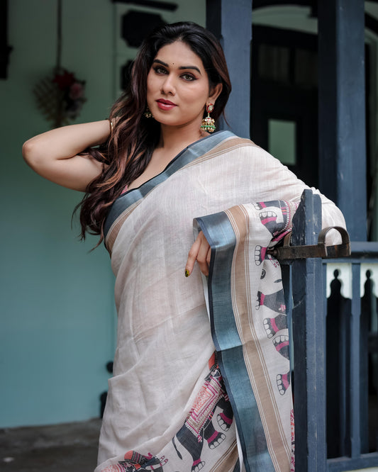 Ivory Pure Cotton Linen Saree And Elephant Motif and Tassel Detailing With Unstitched Blouse
