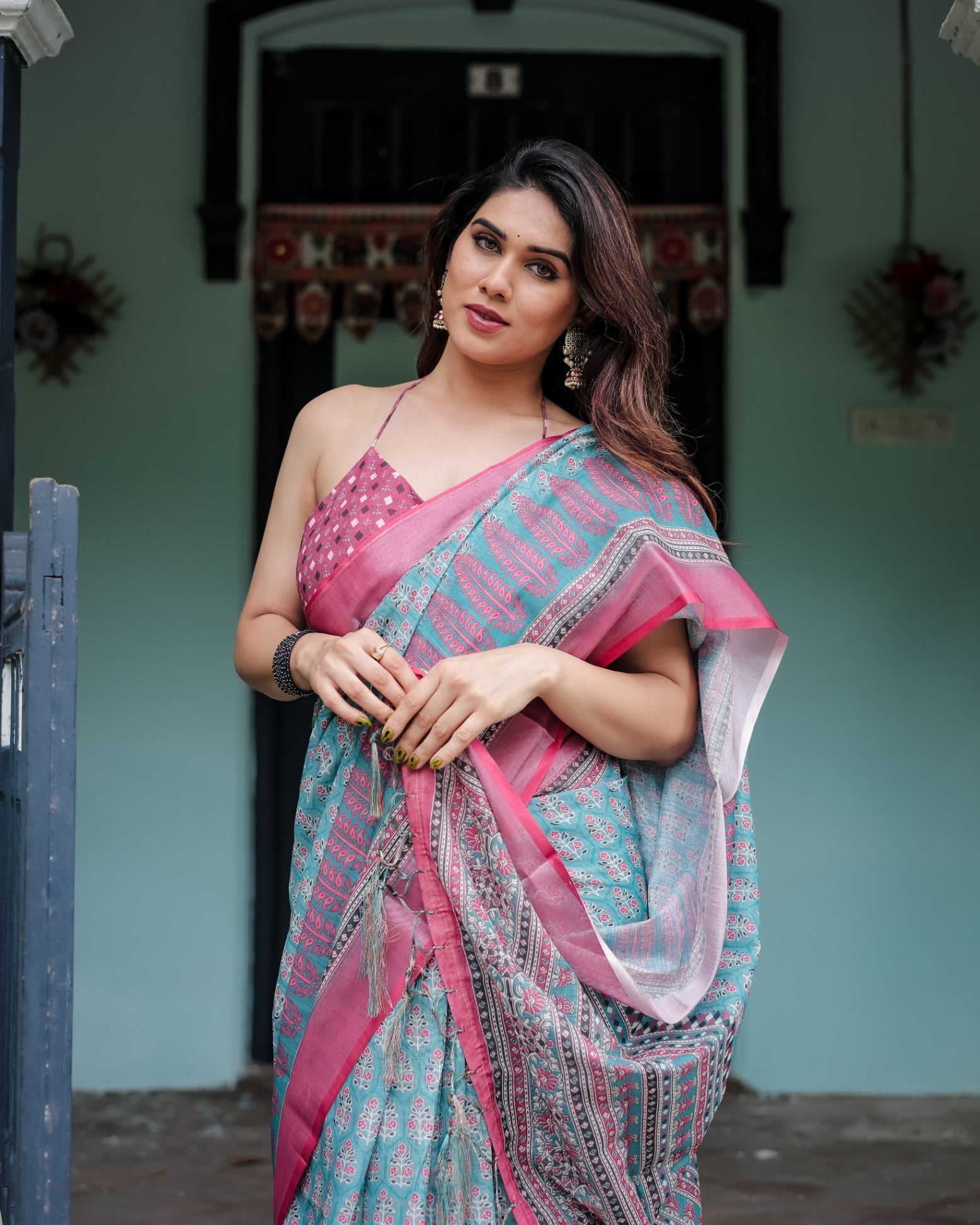 Aqua Blue Pure Cotton Linen Saree Pink Border, Floral Motifs, and Tassel Detailing With Unstitched Blouse