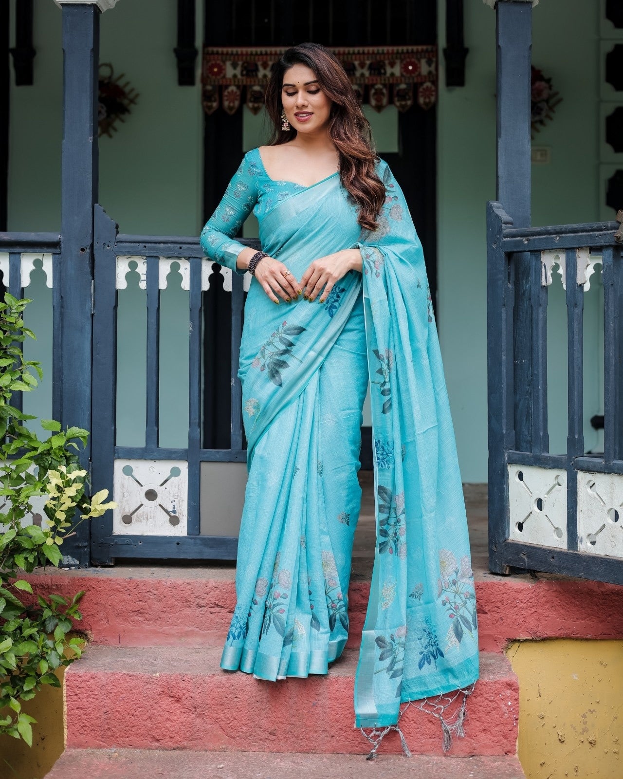 Aqua Blue Pure Cotton Linen Saree with Floral Design And Tassel Detailing With Unstitched Blouse