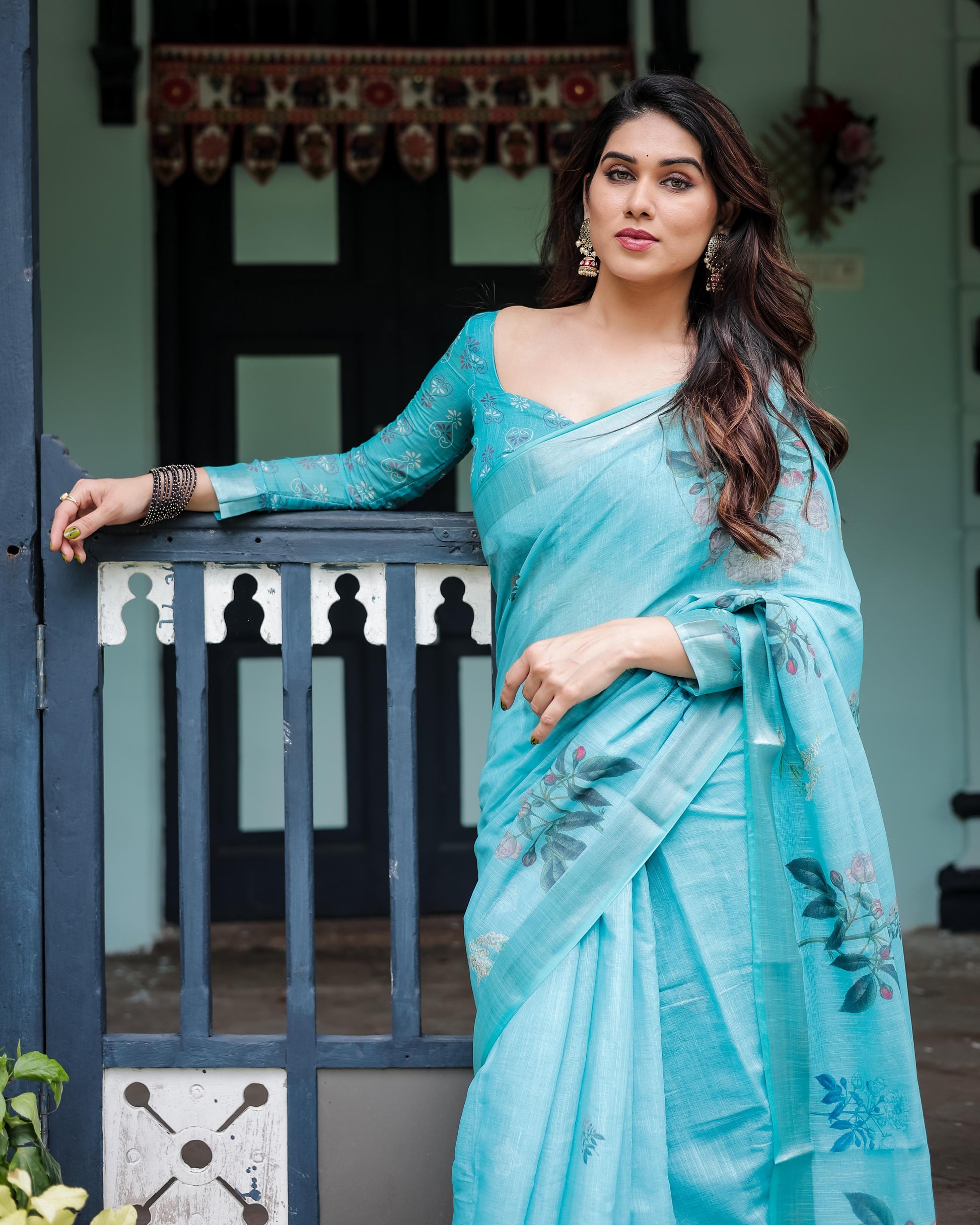 Aqua Blue Pure Cotton Linen Saree with Floral Design And Tassel Detailing With Unstitched Blouse