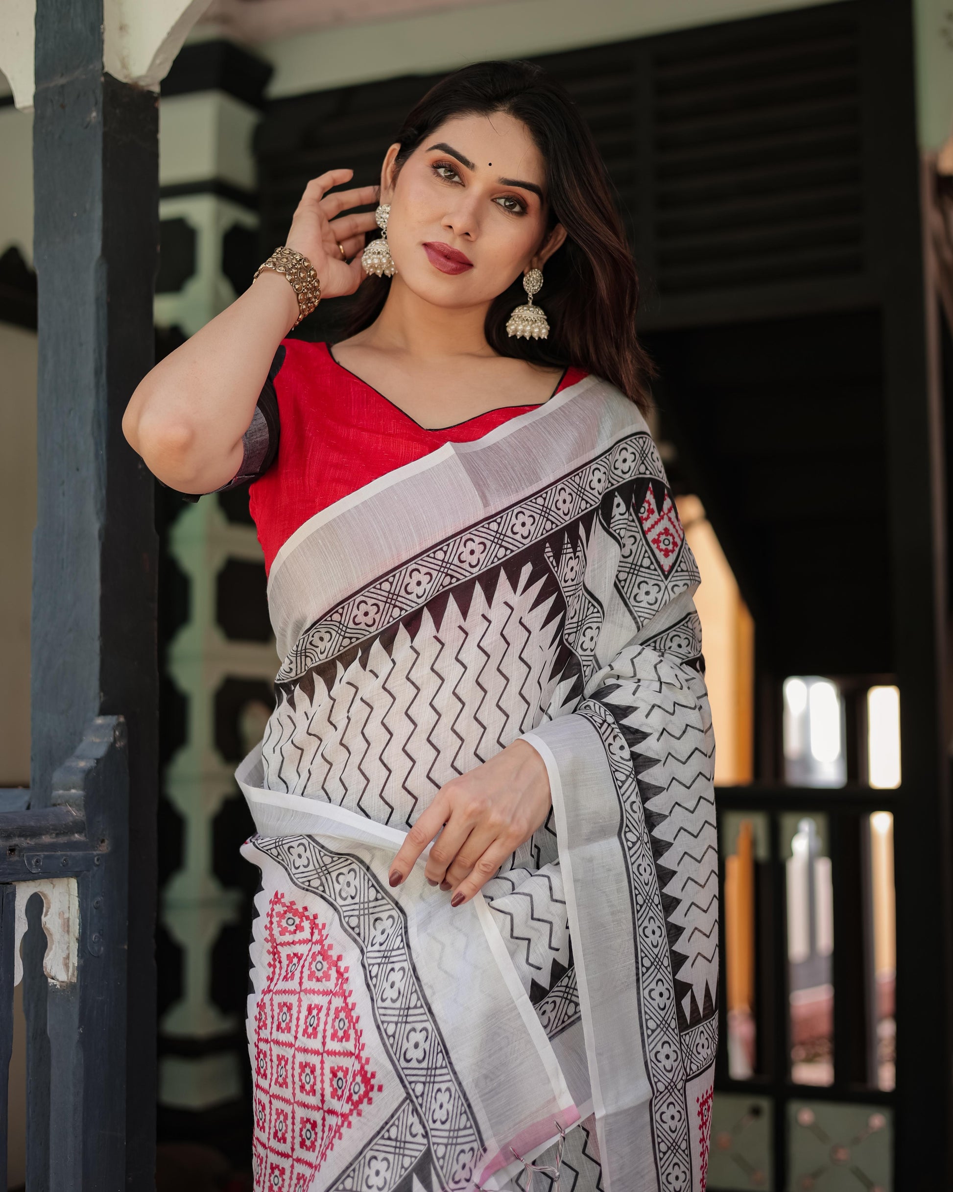 Black and White Geometric Pattern Pure Cotton Linen Saree with Red Accents And Tassel Details With Unstitched Blouse