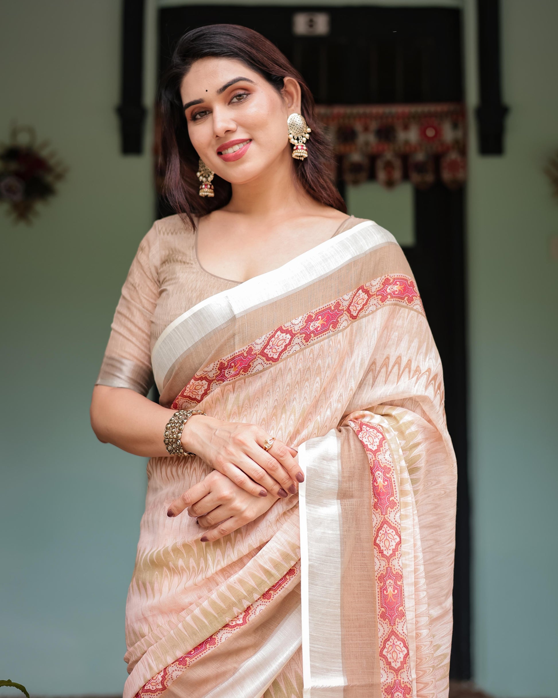 Peach Beige Linen Printed Saree with Designer Border and Tassel Detailing with Unstitched Blouse for Women