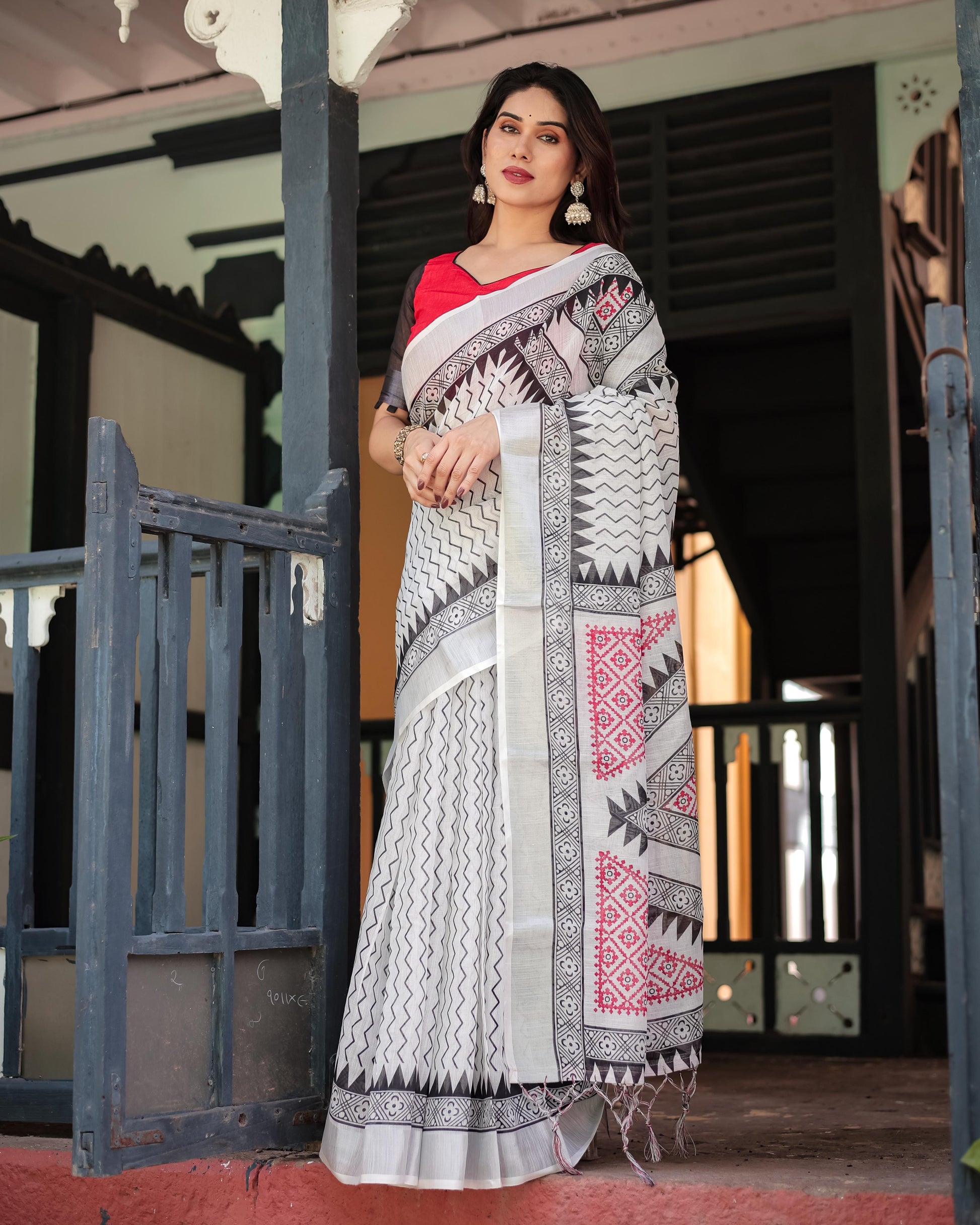 Black and White Geometric Pattern Pure Cotton Linen Saree with Red Accents And Tassel Details With Unstitched Blouse