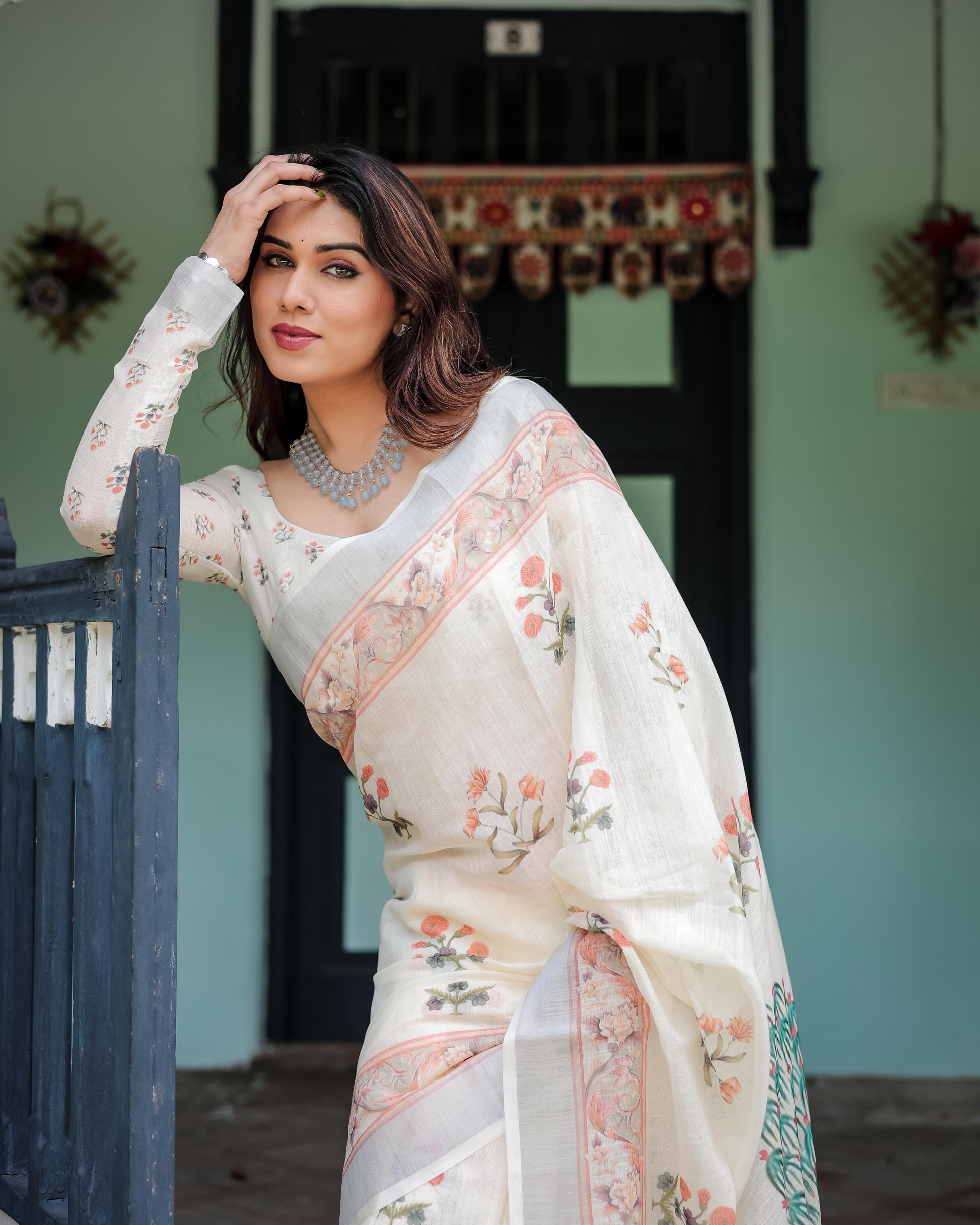 Ivory Pure Cotton Linen Saree with Pastel Floral Design And Tassel Detailing With Unstitched Blouse