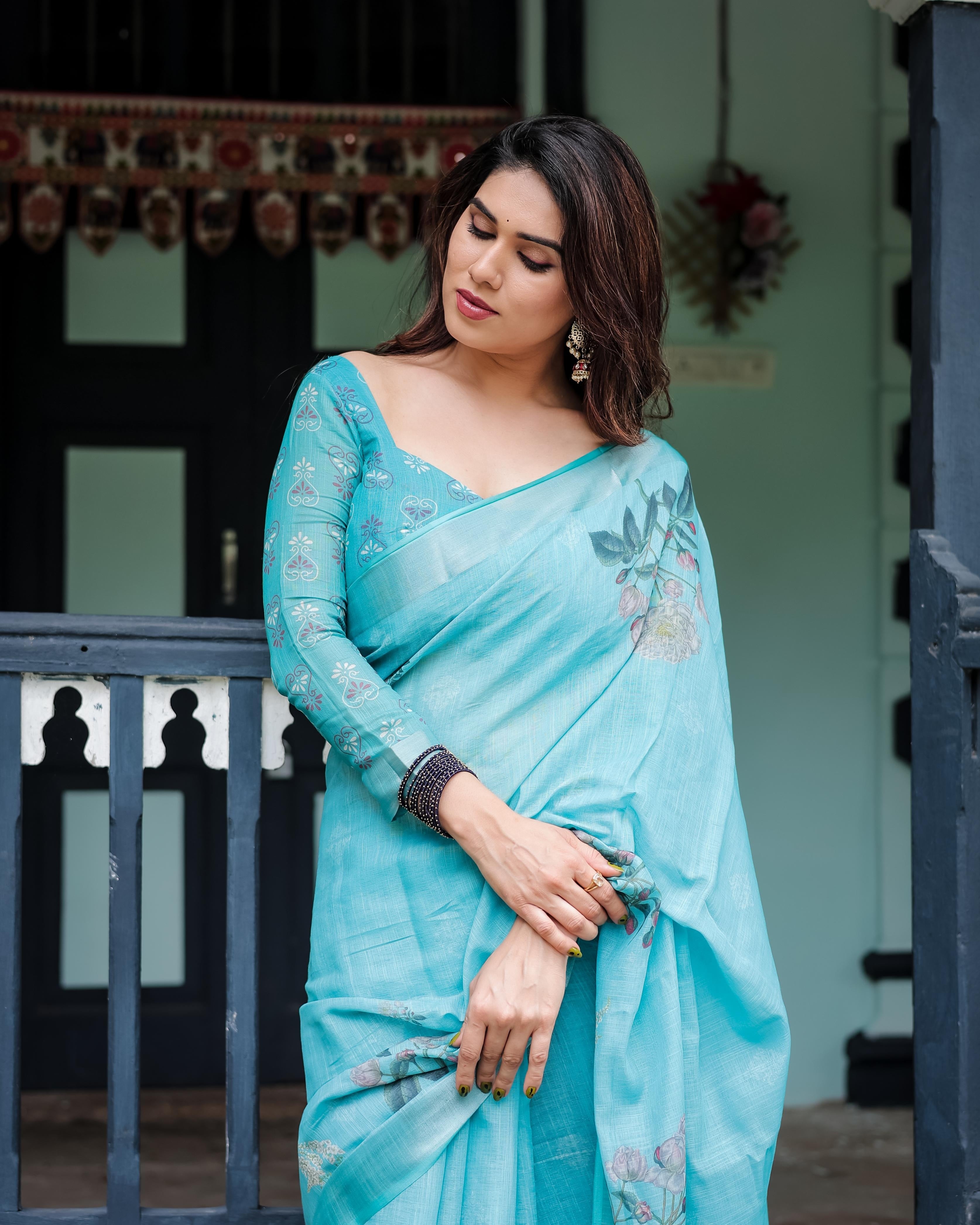 Aqua Blue Pure Cotton Linen Saree with Floral Design And Tassel Detailing With Unstitched Blouse