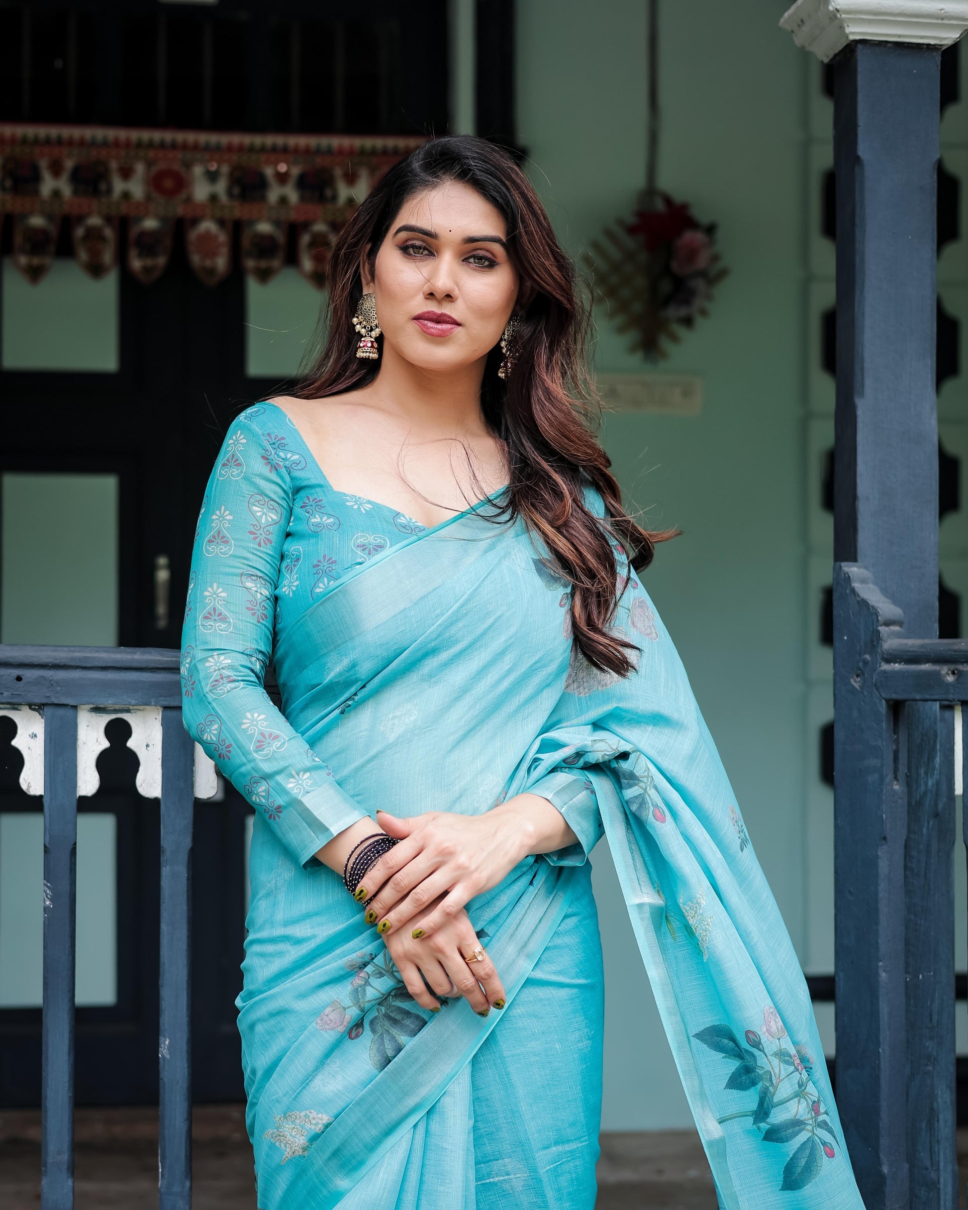 Aqua Blue Pure Cotton Linen Saree with Floral Design And Tassel Detailing With Unstitched Blouse