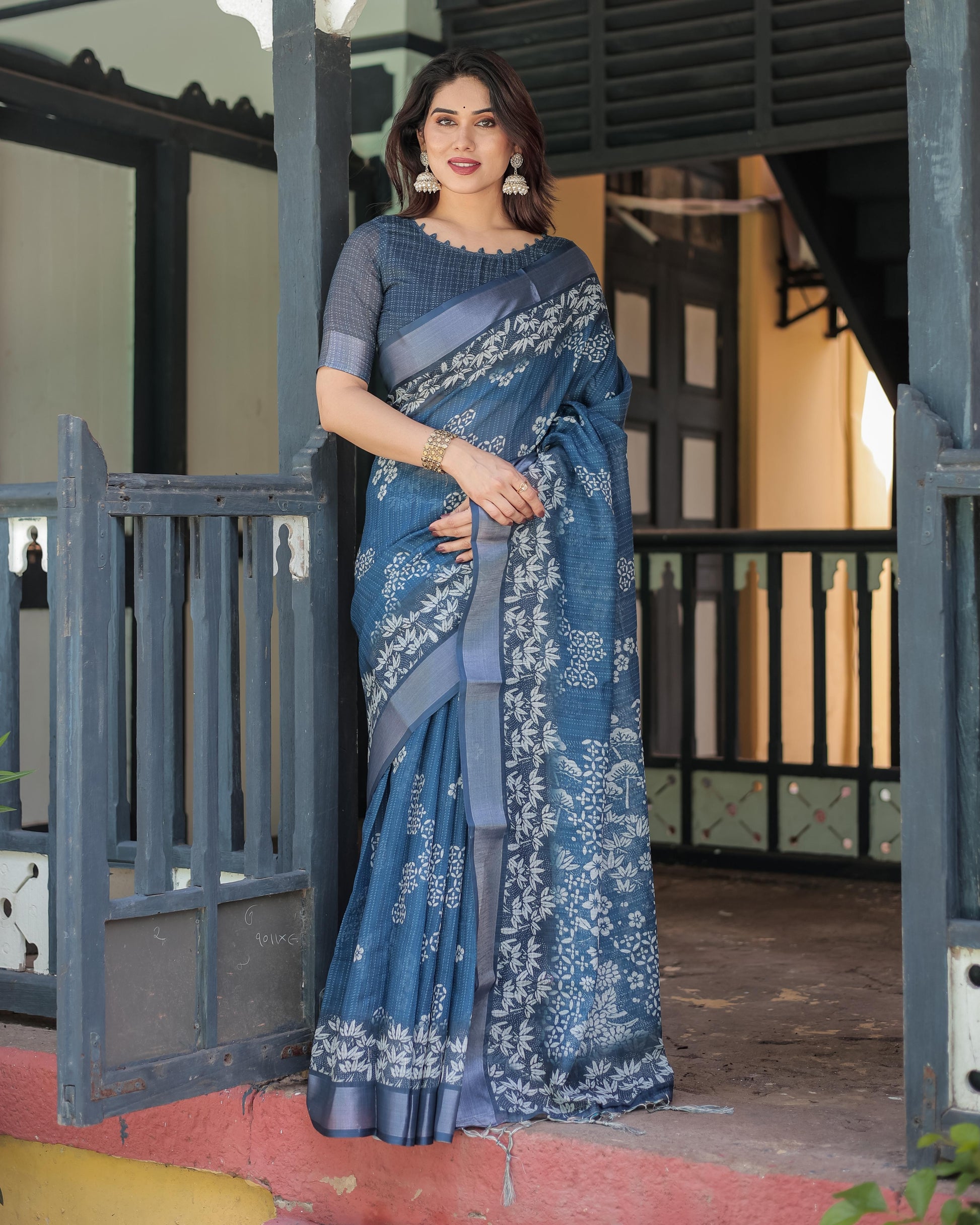 Steel Blue Linen Floral Printed Saree with Elegant Border Design and Tassel Detailing with Unstitched Blouse for Women
