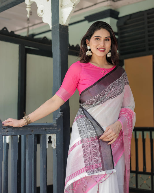 White and Pink Linen Printed Saree with Contrast Border Design and Tassel Detailing with Unstitched Blouse for Women