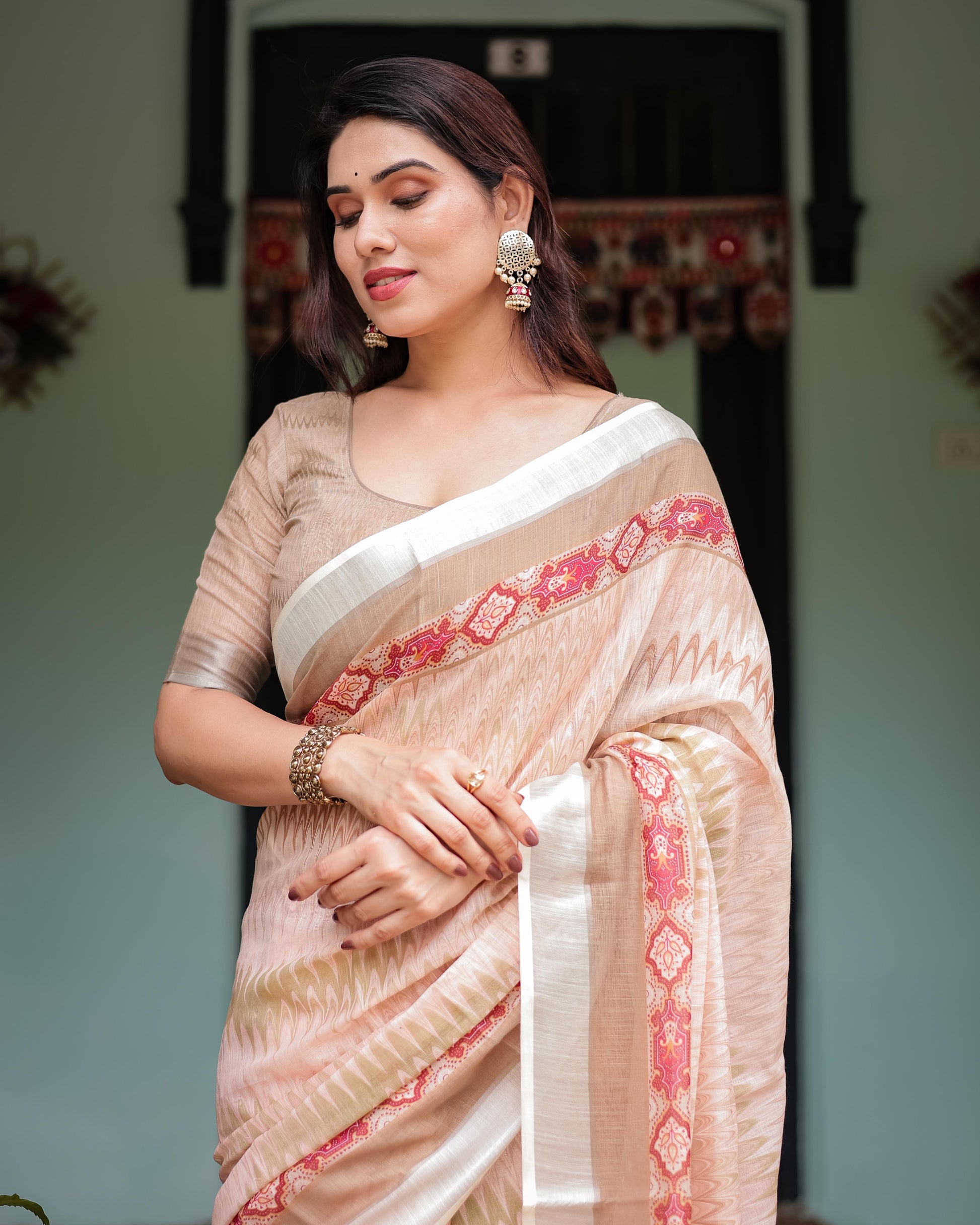 Peach Beige Linen Printed Saree with Designer Border and Tassel Detailing with Unstitched Blouse for Women