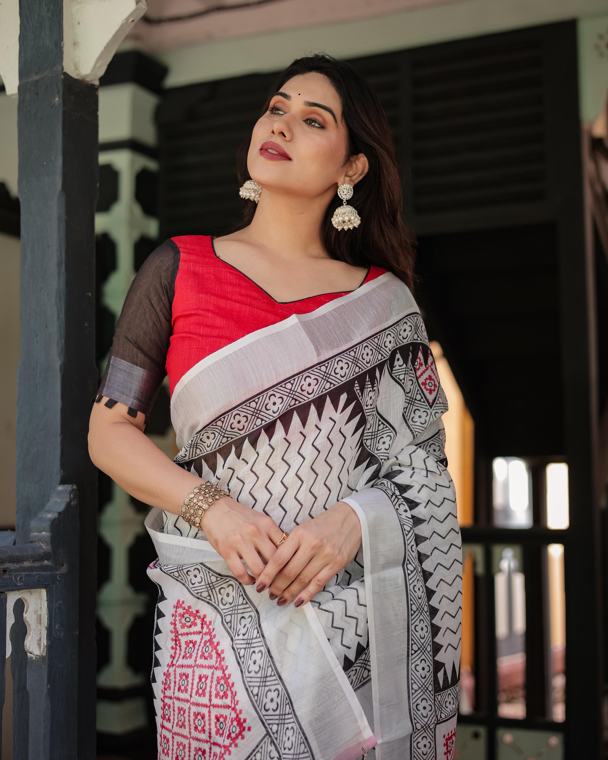 Black and White Geometric Pattern Pure Cotton Linen Saree with Red Accents And Tassel Details With Unstitched Blouse