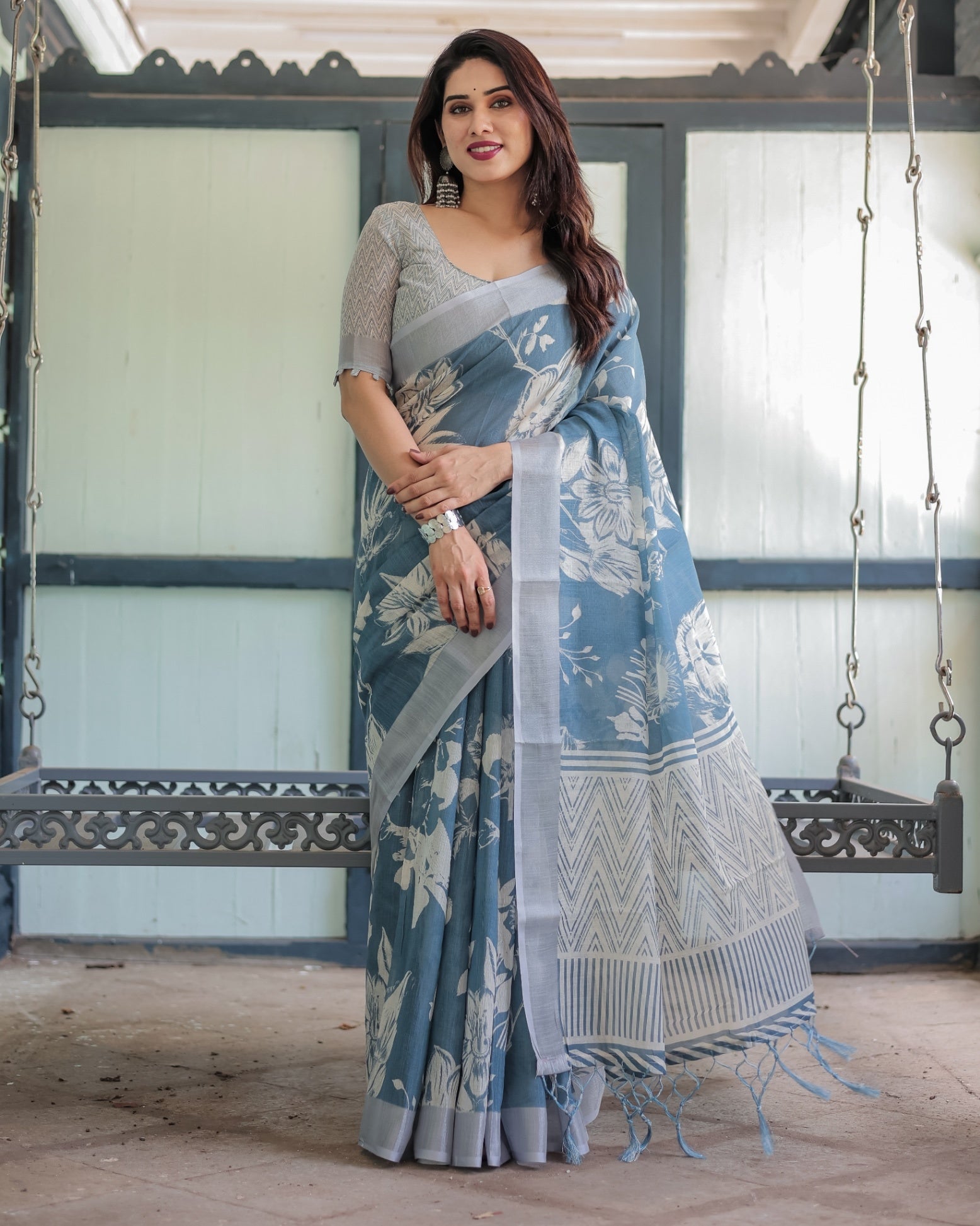 Pastel Blue Floral and Geometric Printed Cotton Linen Saree and Tassel Edges With Unstitched Blouse