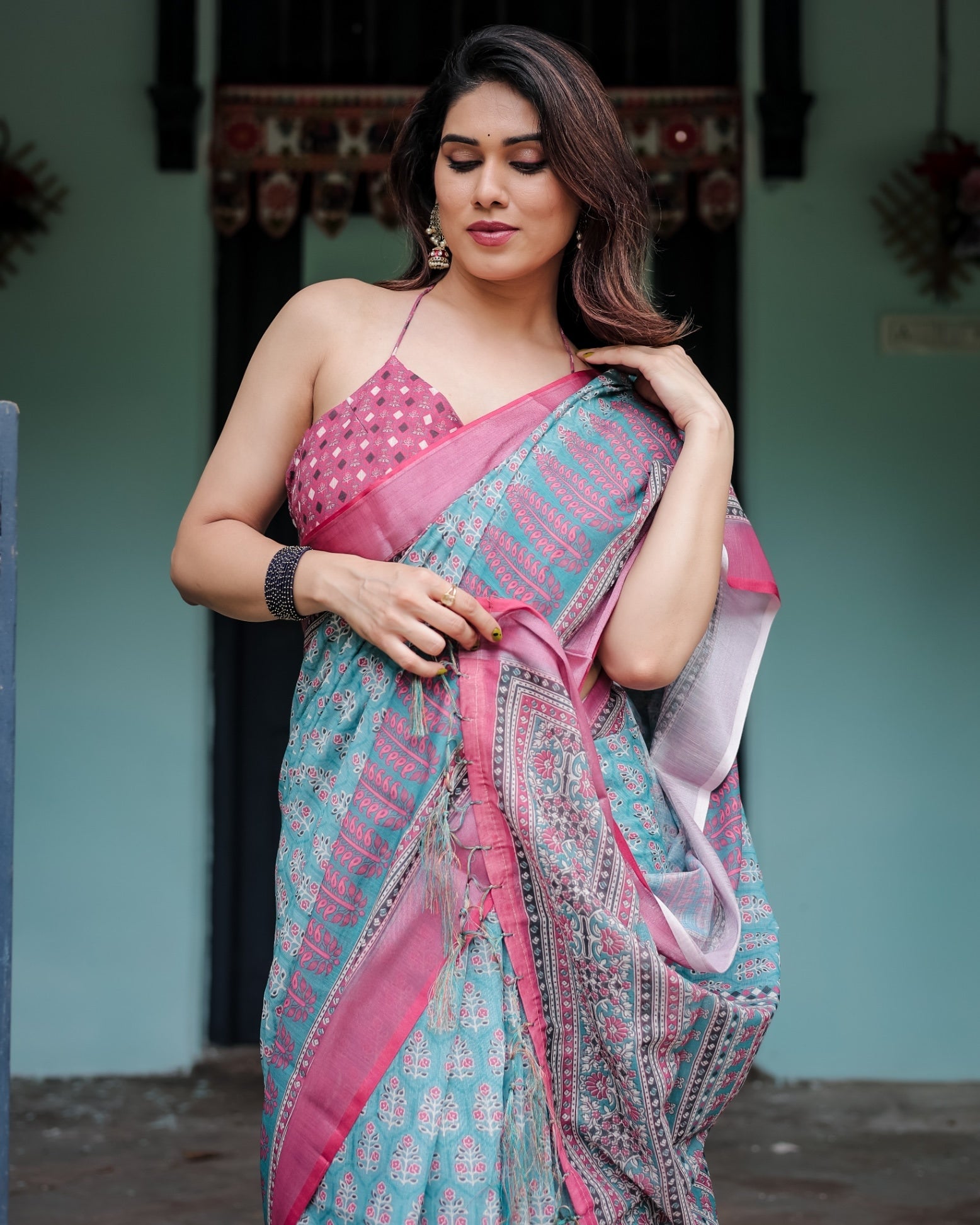 Aqua Blue Pure Cotton Linen Saree Pink Border, Floral Motifs, and Tassel Detailing With Unstitched Blouse