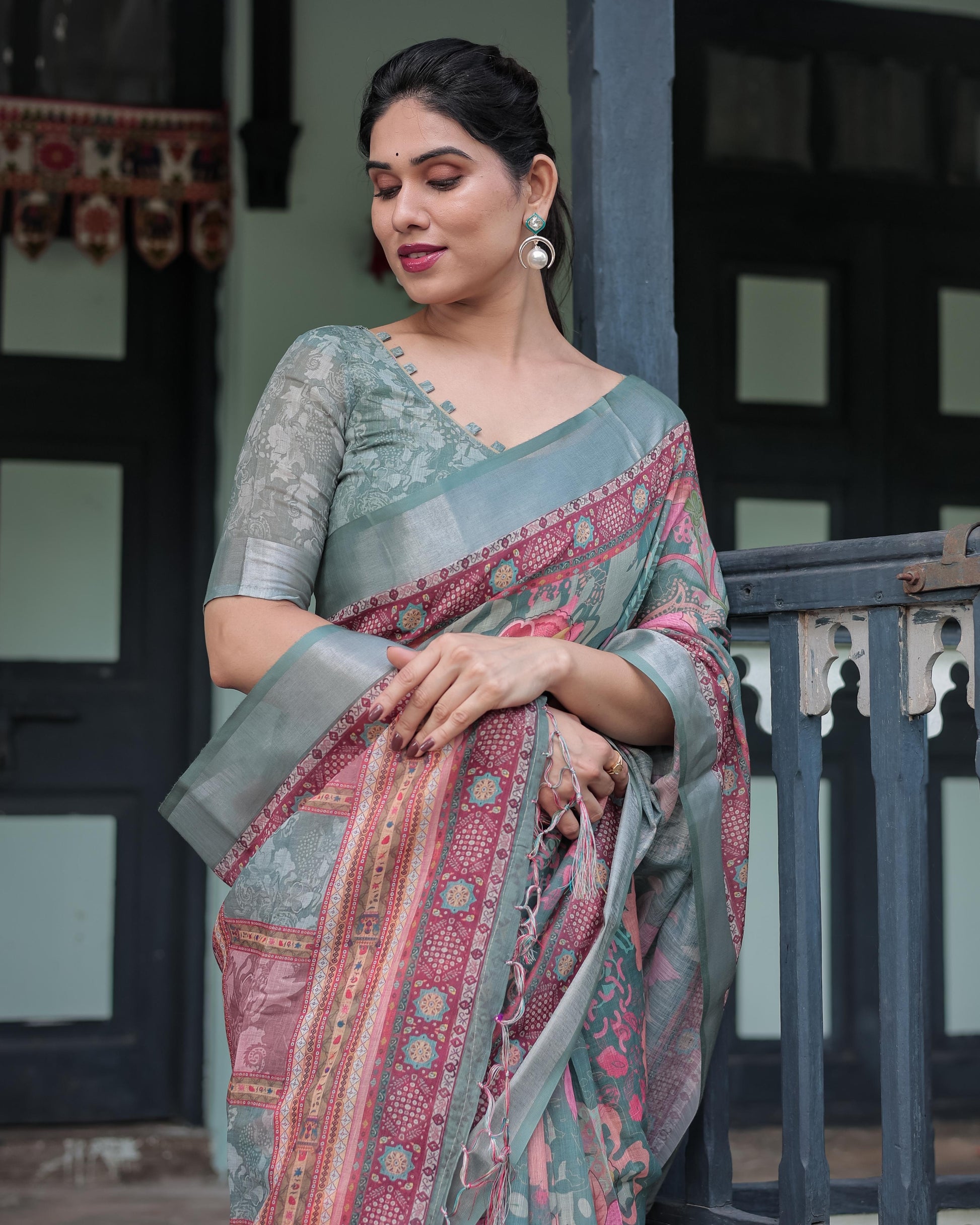 Sage Green Linen Printed Saree with Traditional Border Design and Tassel Detailing with Unstitched Blouse for Women