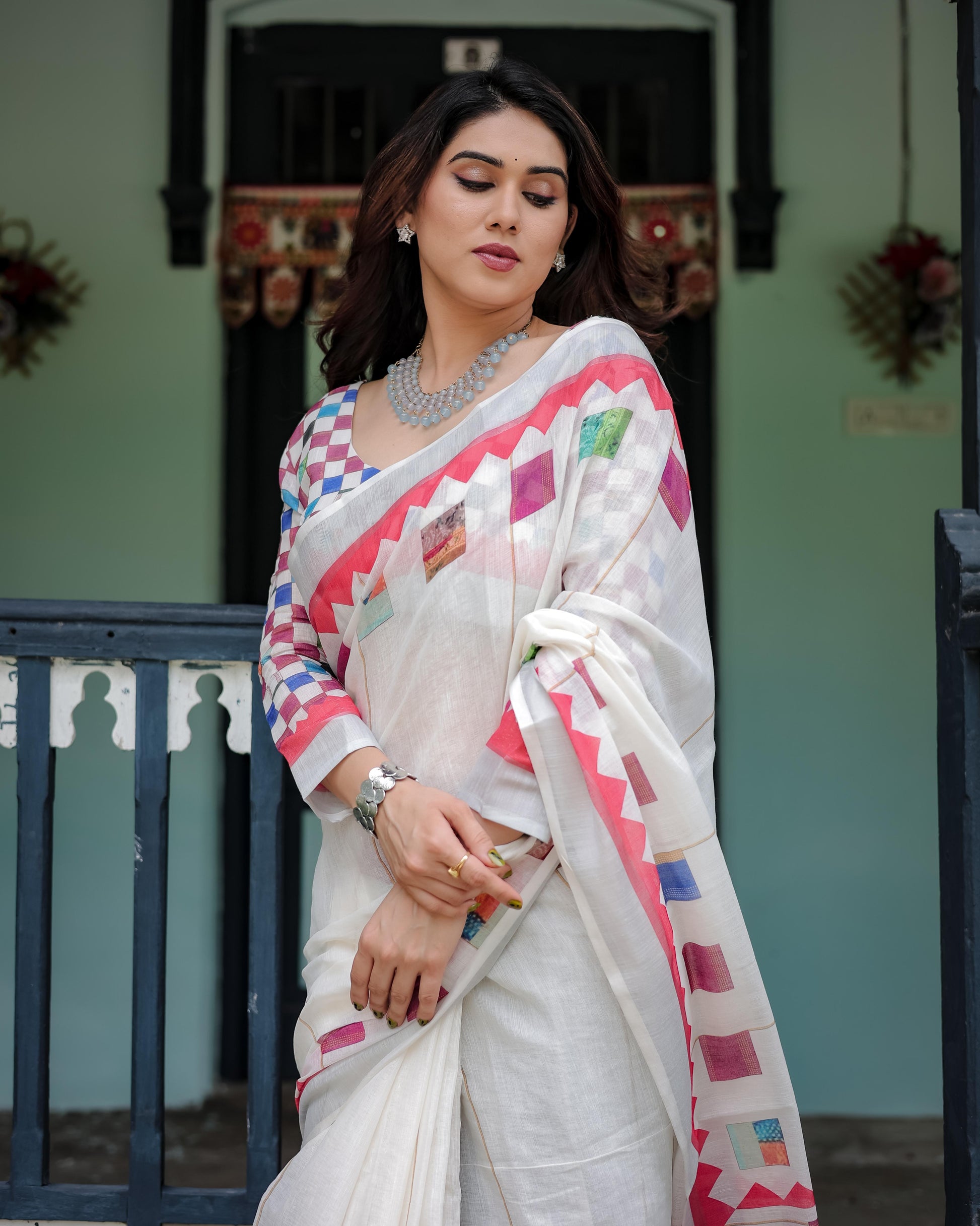White Pure Cotton Linen Saree with Multicolor Checkered Design And Tassel Detailing With Unstitched Blouse